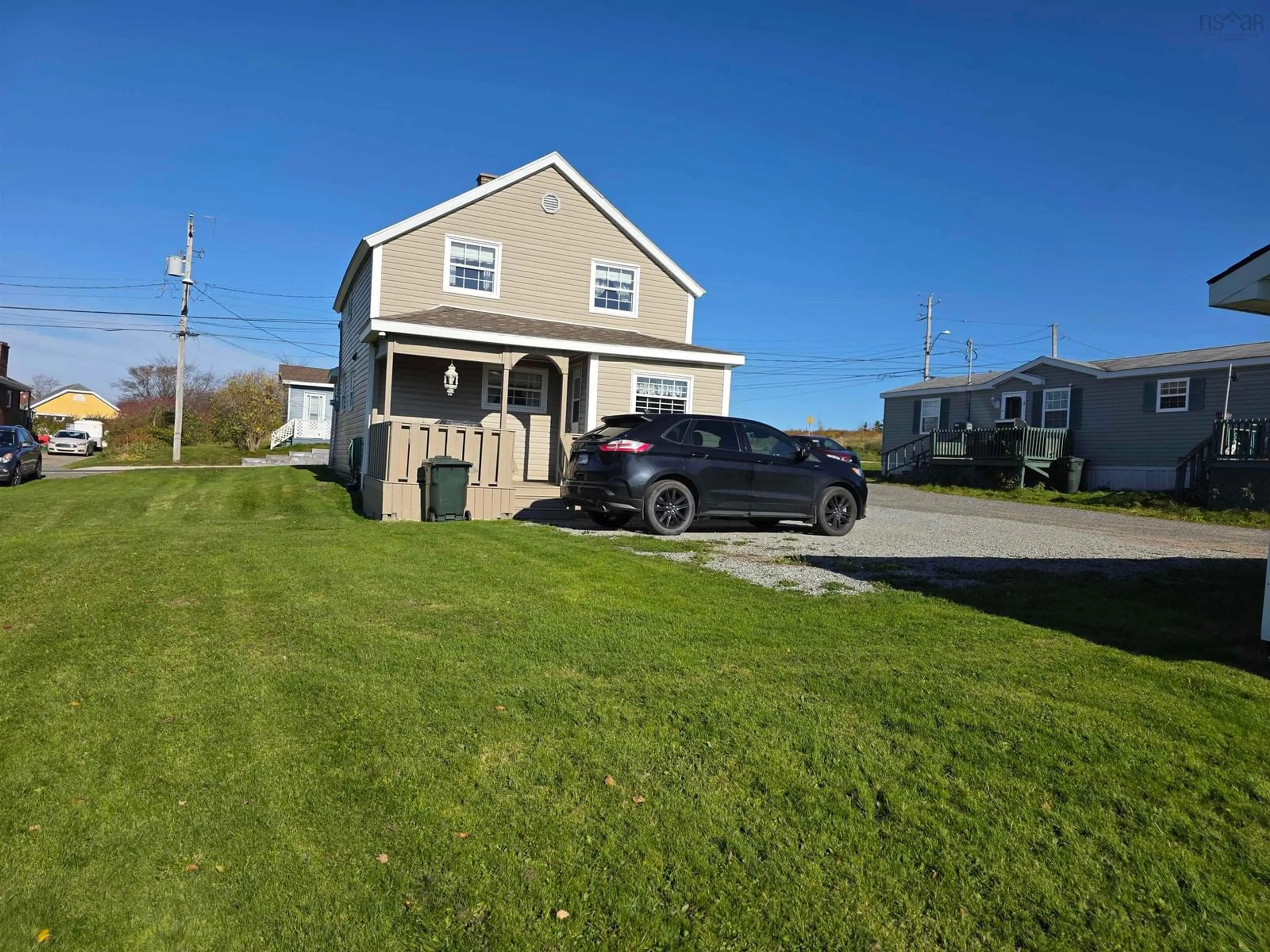 A pic from outside/outdoor area/front of a property/back of a property/a pic from drone, street for 40 Church St, Sydney Mines Nova Scotia B1V 2R9