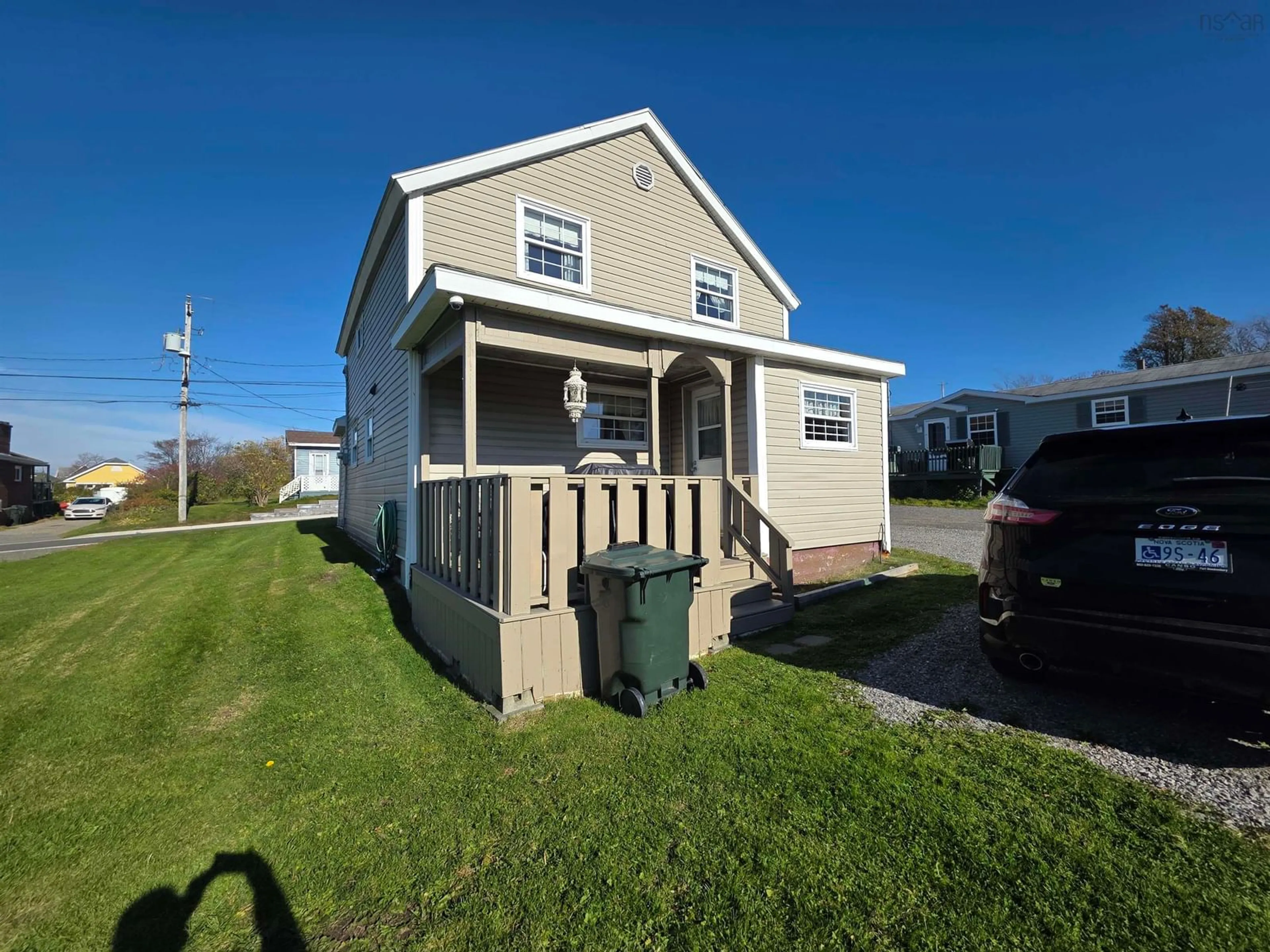 A pic from outside/outdoor area/front of a property/back of a property/a pic from drone, street for 40 Church St, Sydney Mines Nova Scotia B1V 2R9