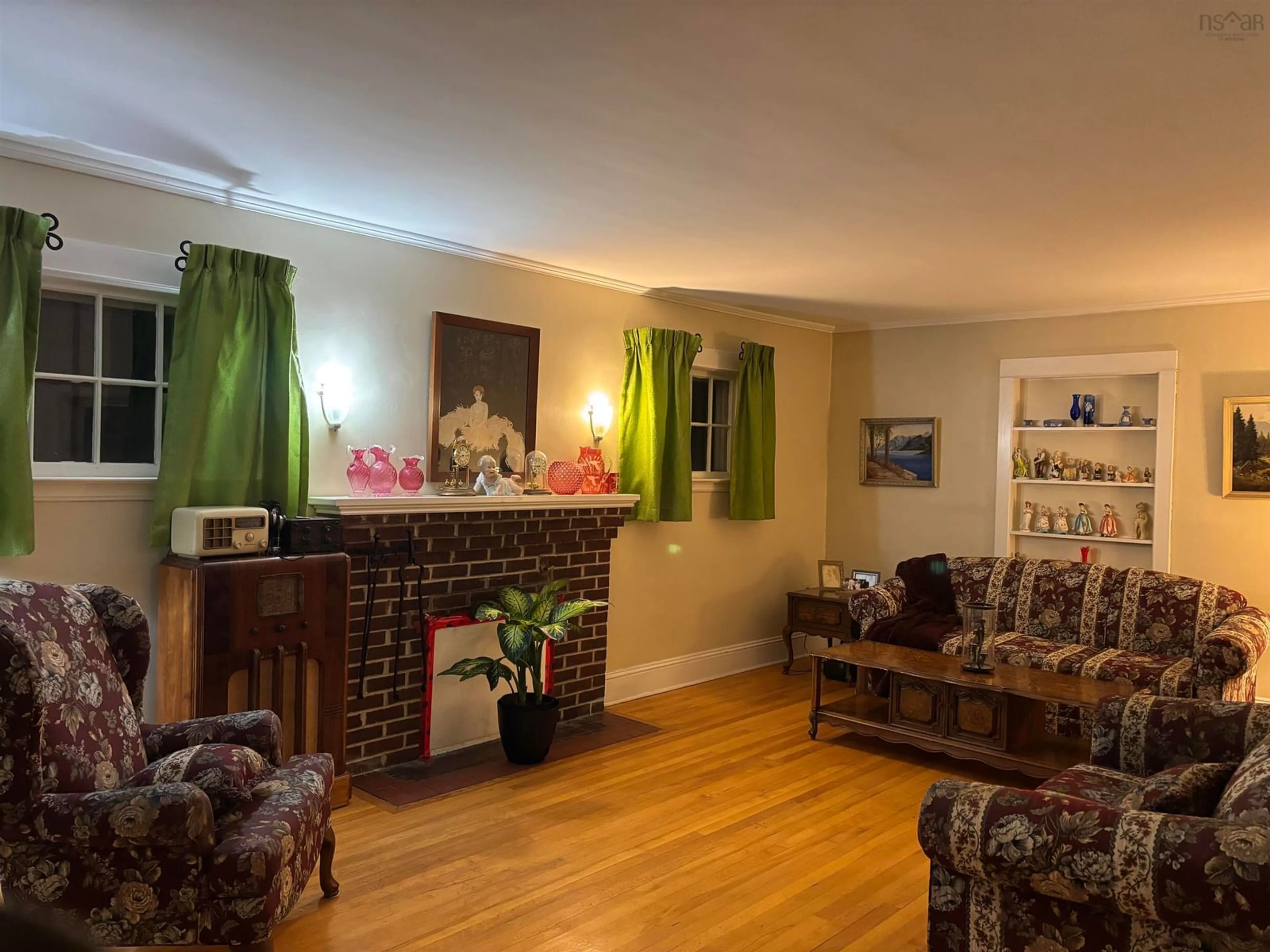 Living room with furniture, wood/laminate floor for 54 Glenview Ave, Kentville Nova Scotia B4N 2R7