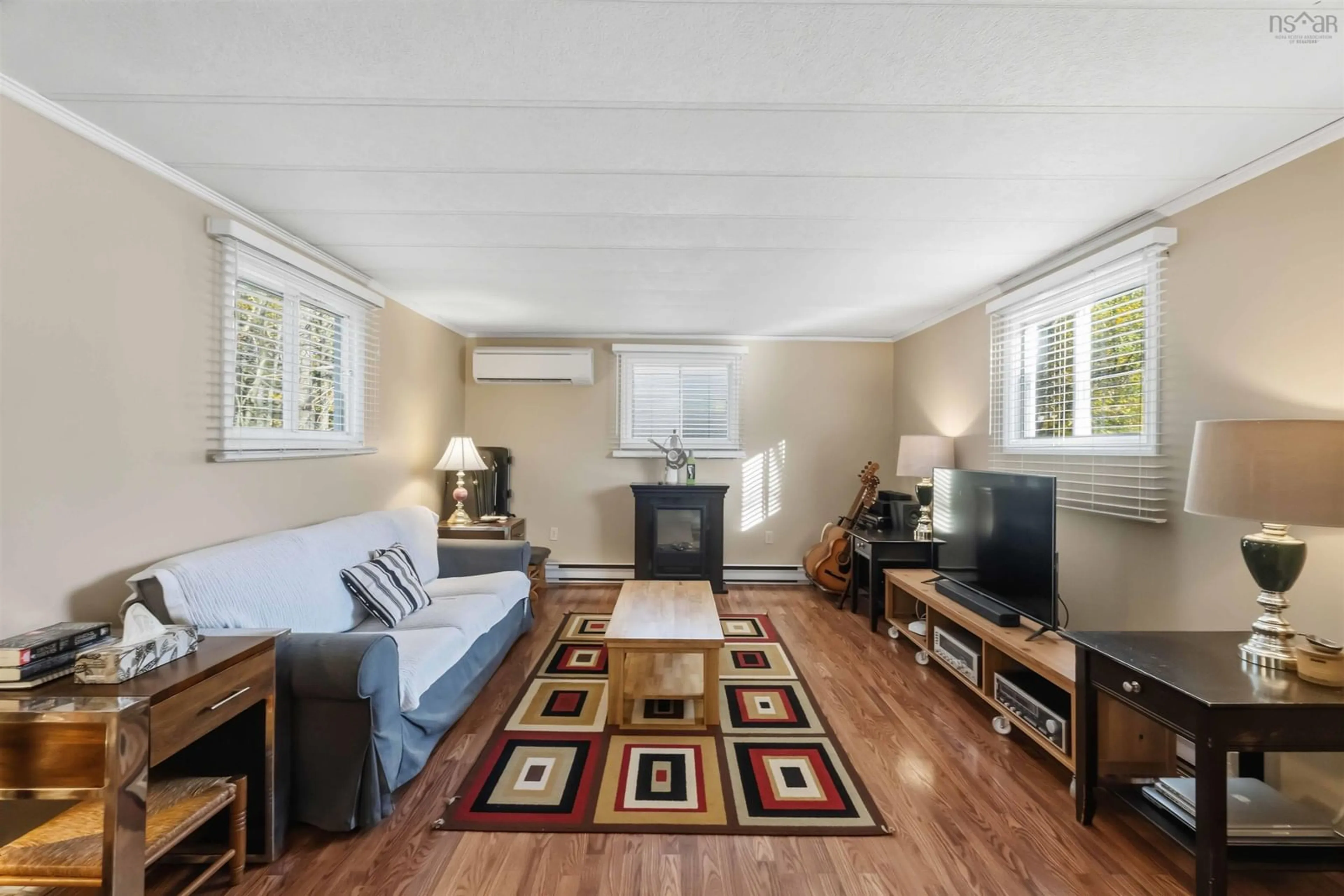 Living room with furniture, wood/laminate floor for 339 Highbury School Road, Canaan Nova Scotia B4N 4K1