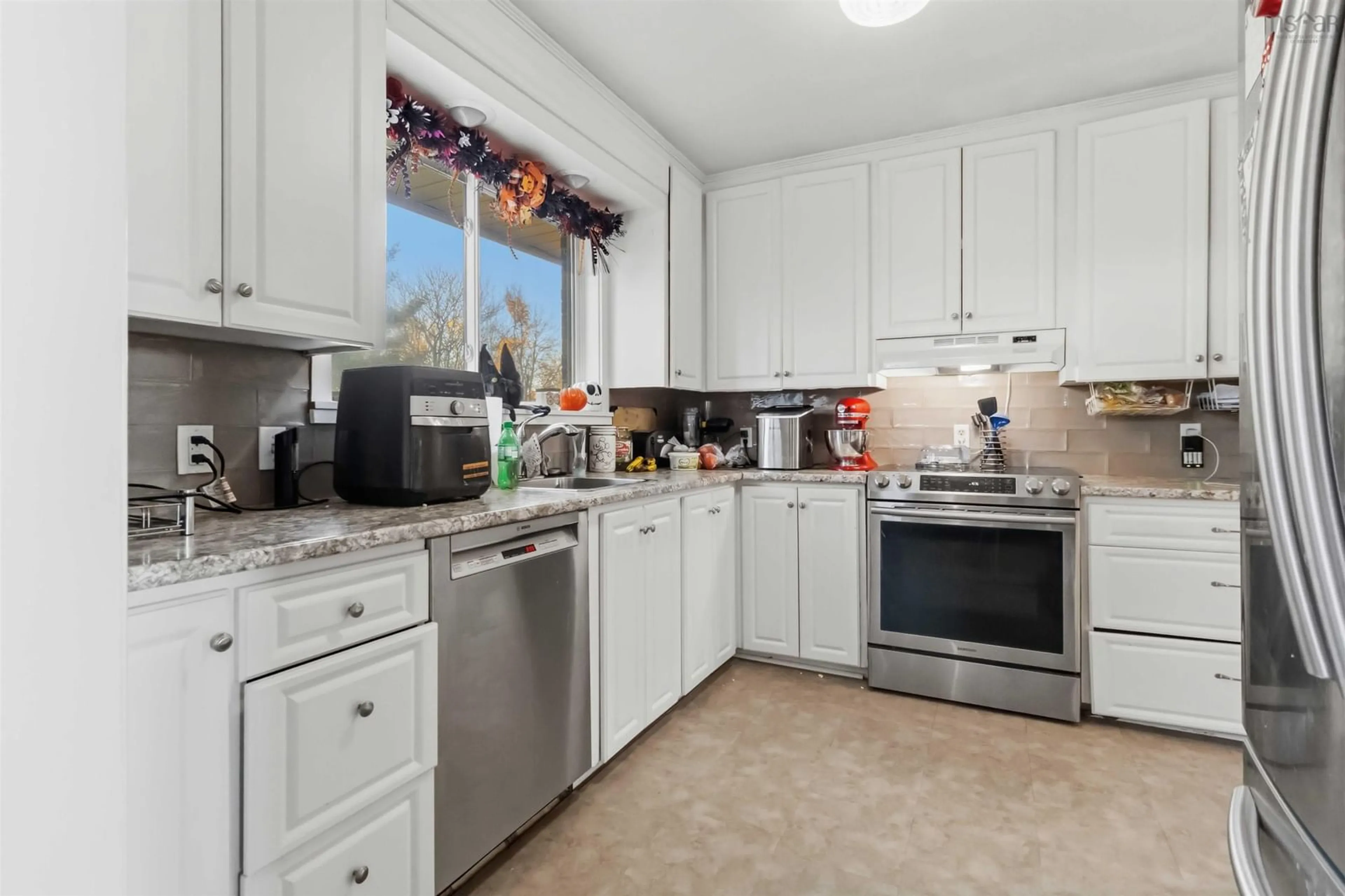 Standard kitchen, ceramic/tile floor for 52 Brentwood Avenue, Timberlea Nova Scotia B3T 1E5