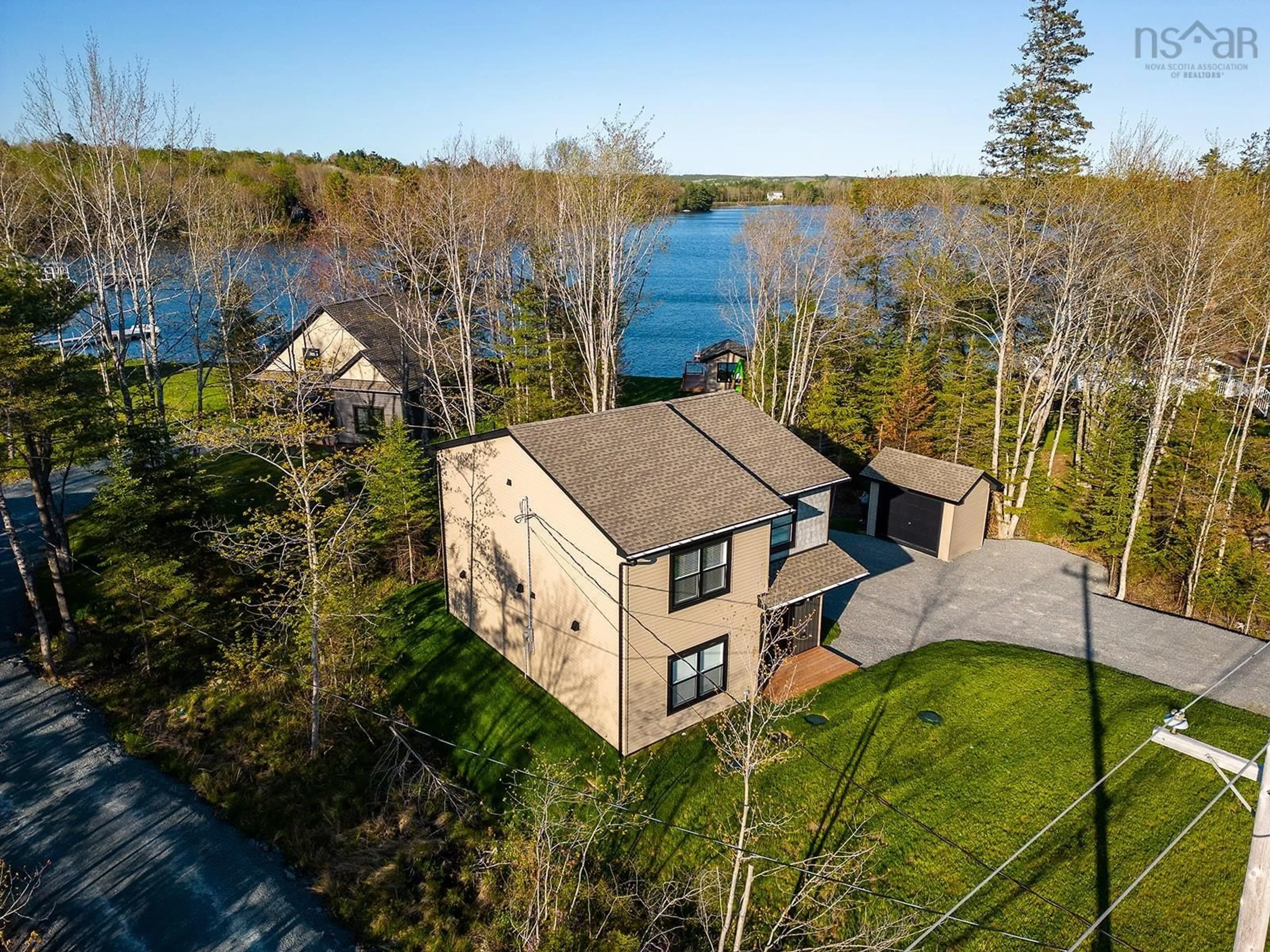 A pic from outside/outdoor area/front of a property/back of a property/a pic from drone, water/lake/river/ocean view for 495 Highway 1, Mount Uniacke Nova Scotia B0N 1Z0