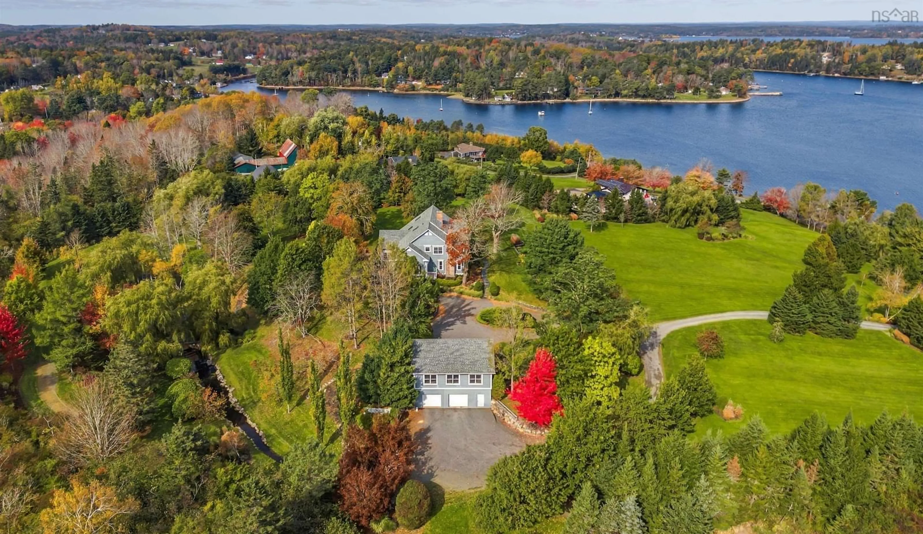 A pic from outside/outdoor area/front of a property/back of a property/a pic from drone, water/lake/river/ocean view for 116 Princes Inlet Dr, Martins Brook Nova Scotia B0J 2C0