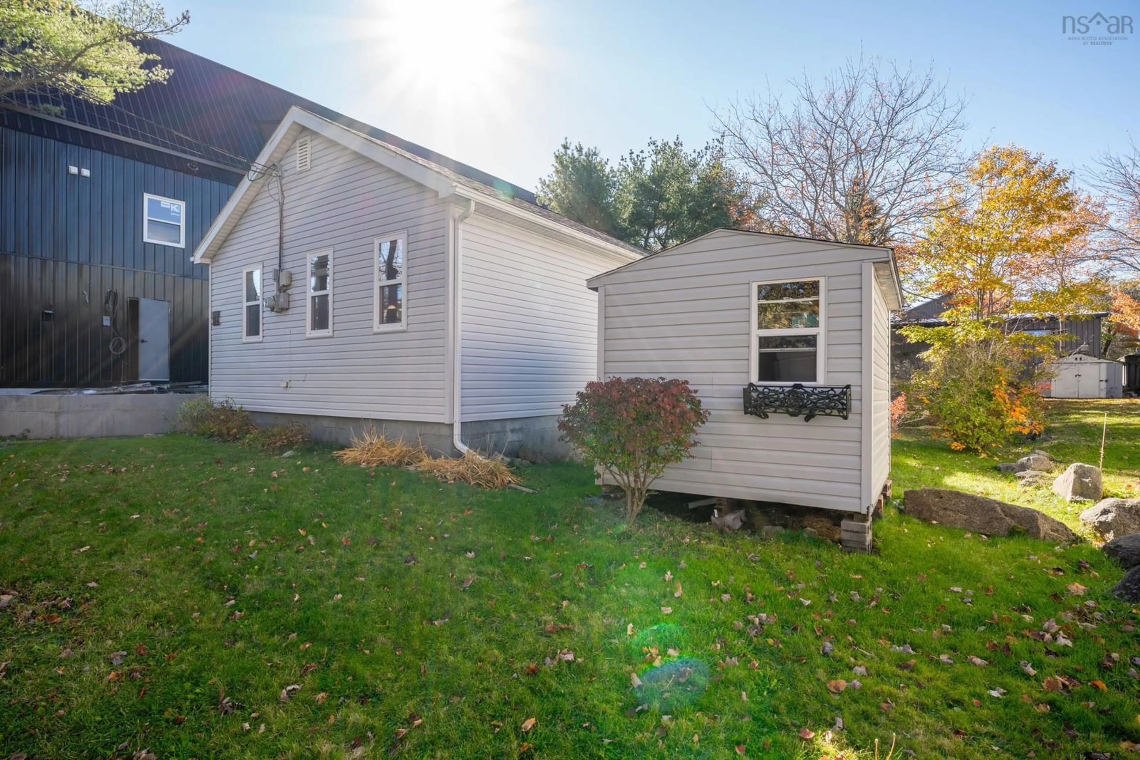 Home with vinyl exterior material, street for 21 River Rd, Spryfield Nova Scotia B3R 1T9