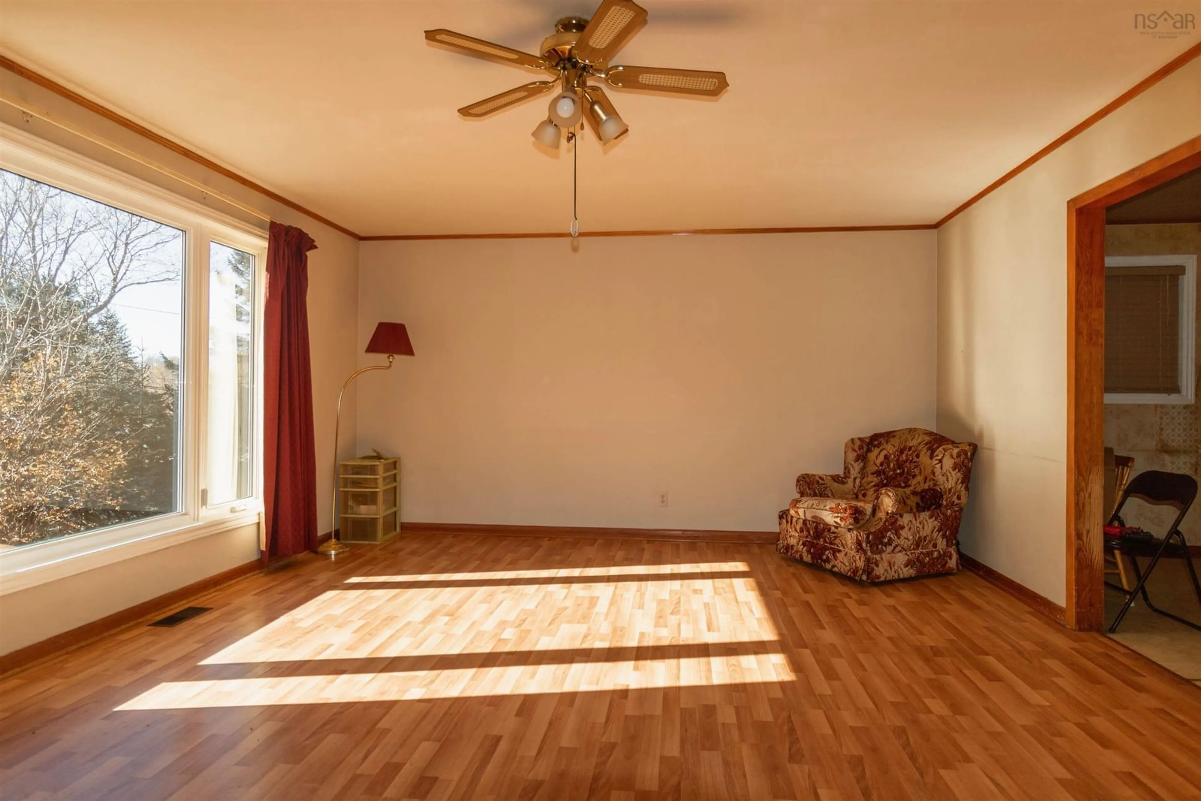 Living room with furniture, wood/laminate floor for 317 Etter Rd, Mount Uniacke Nova Scotia B0N 1Z0