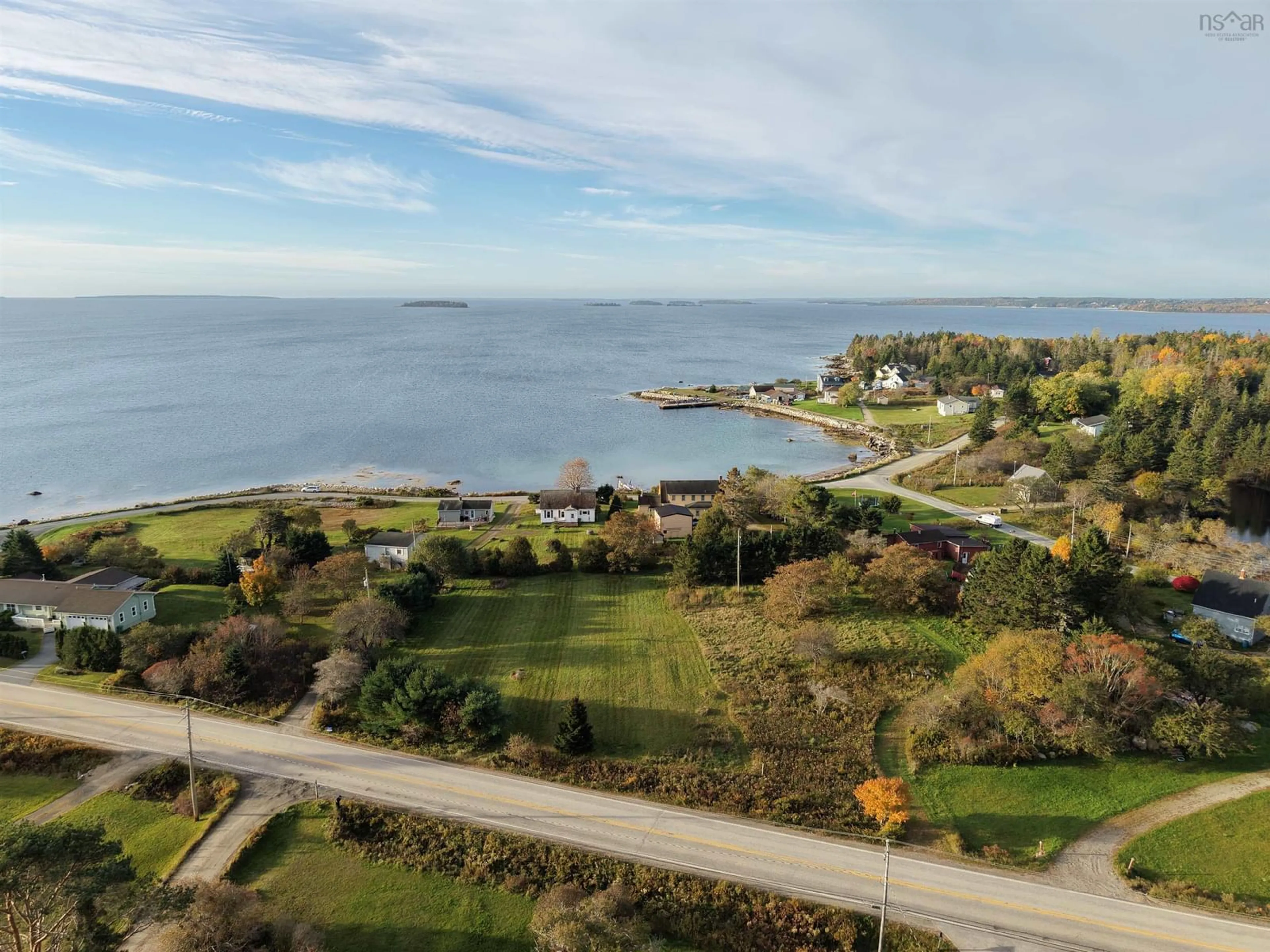 A pic from outside/outdoor area/front of a property/back of a property/a pic from drone, water/lake/river/ocean view for 59 East River Point Rd, East River Point Nova Scotia B0J 1T0
