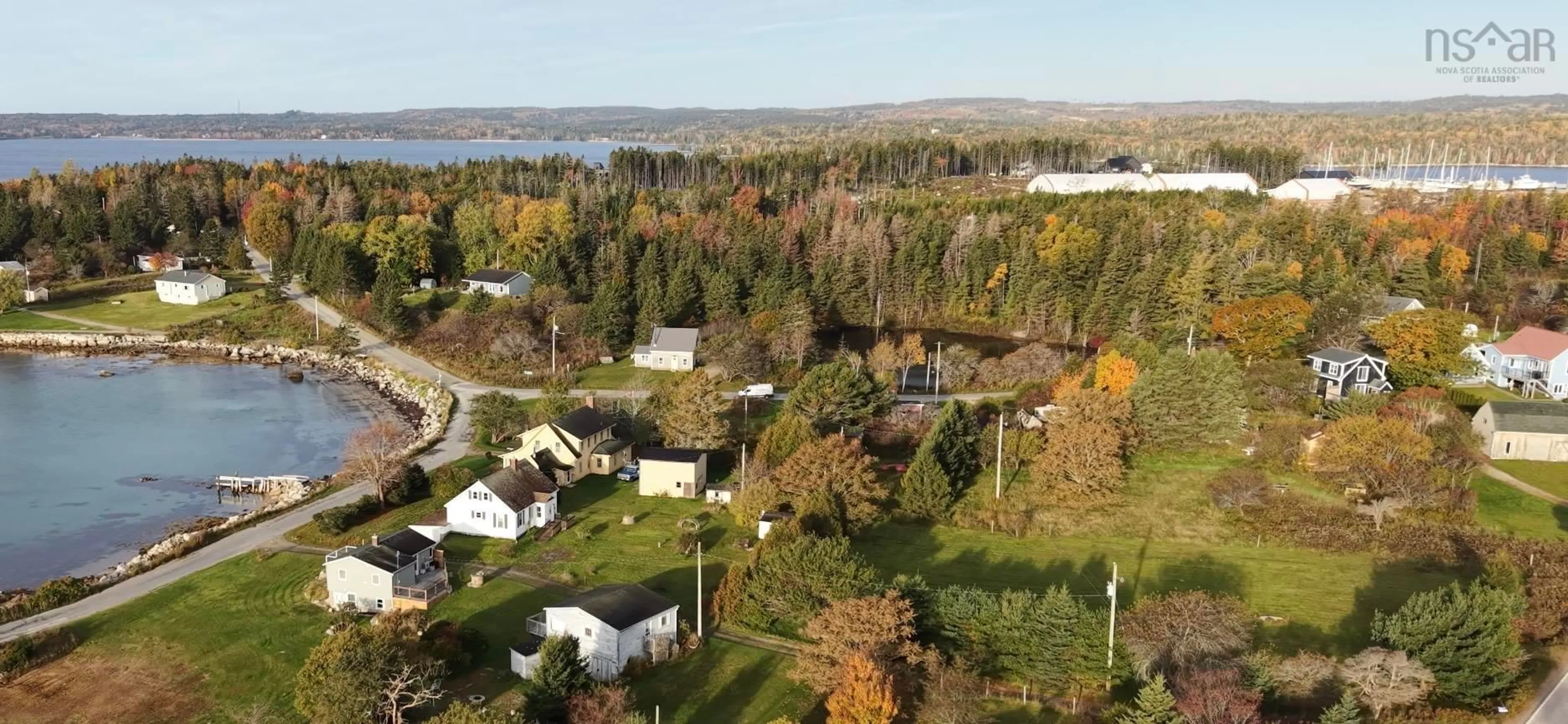 A pic from outside/outdoor area/front of a property/back of a property/a pic from drone, water/lake/river/ocean view for 59 East River Point Rd, East River Point Nova Scotia B0J 1T0