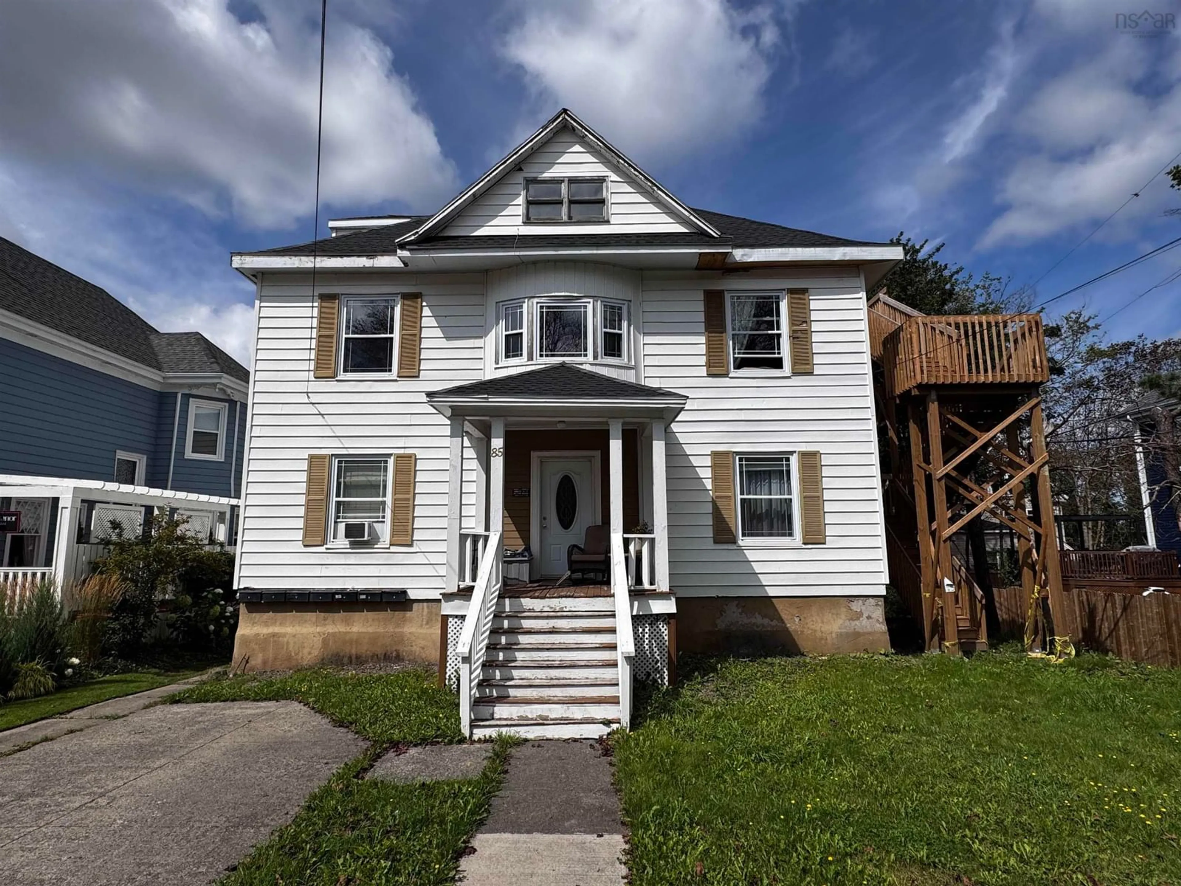 Home with vinyl exterior material, street for 85 Whitney Ave, Sydney Nova Scotia B1P 4Z8
