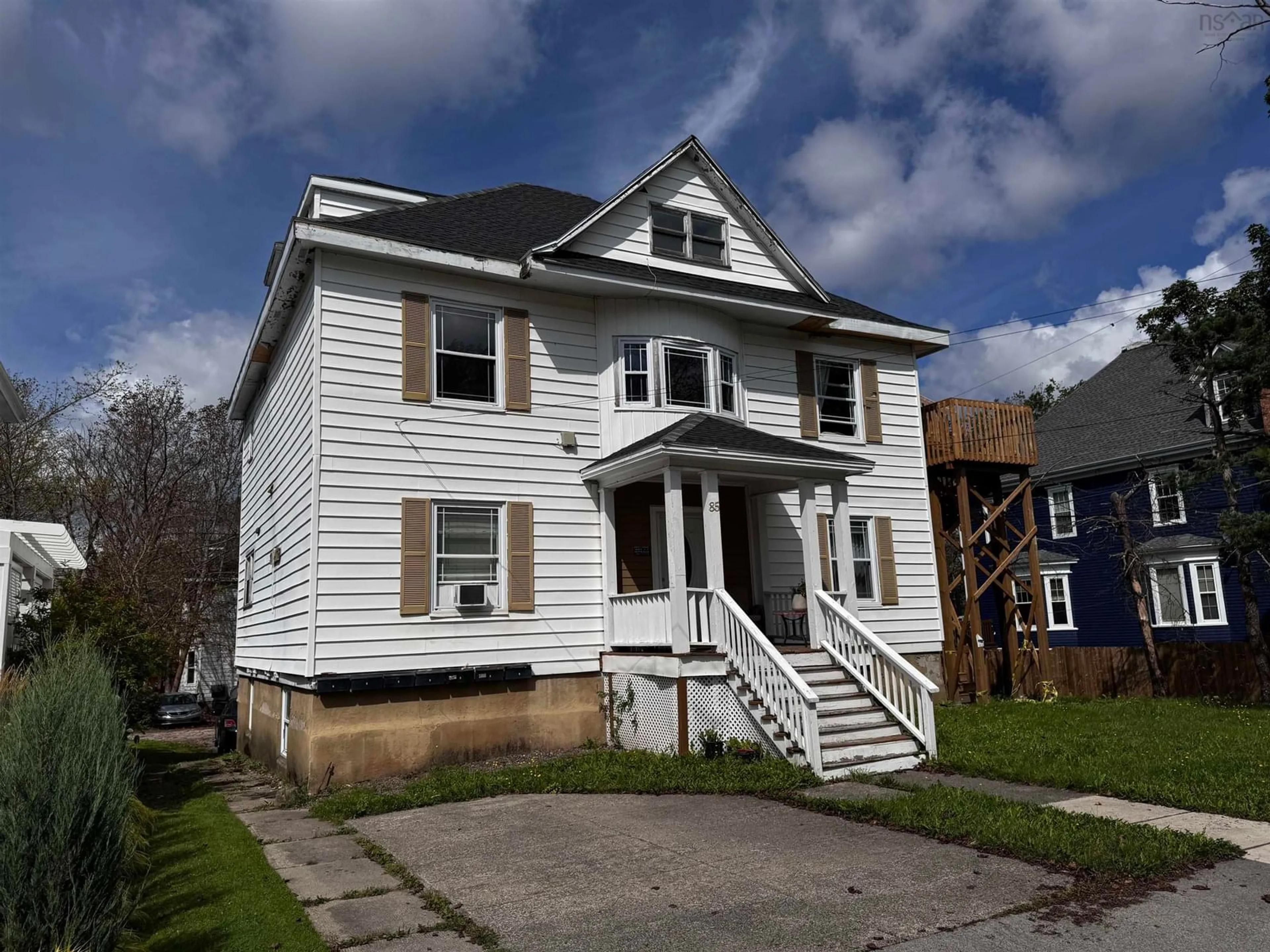 Home with vinyl exterior material, street for 85 Whitney Ave, Sydney Nova Scotia B1P 4Z8