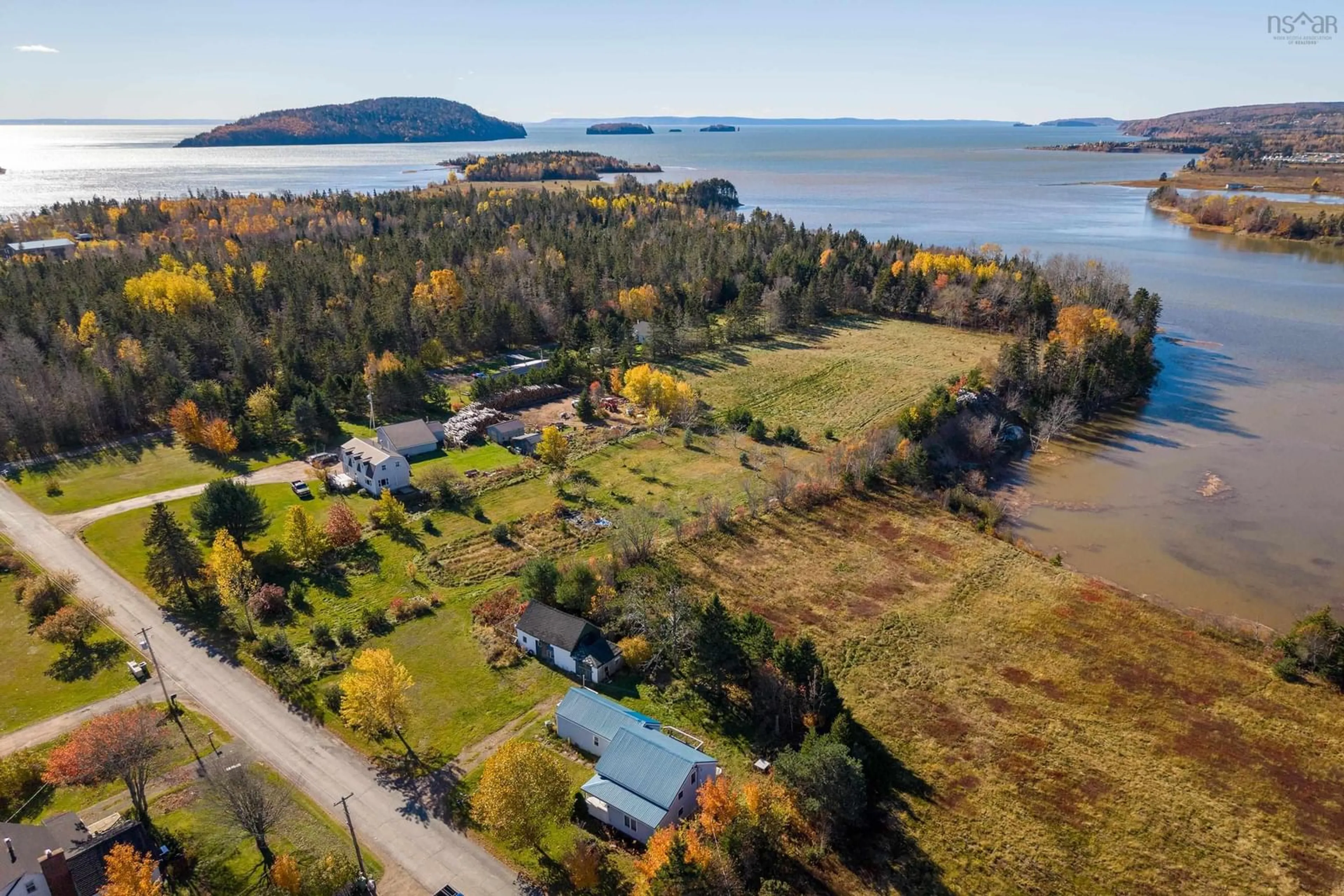 A pic from outside/outdoor area/front of a property/back of a property/a pic from drone, water/lake/river/ocean view for 70 Wharf Rd, Five Islands Nova Scotia B0M 1K0