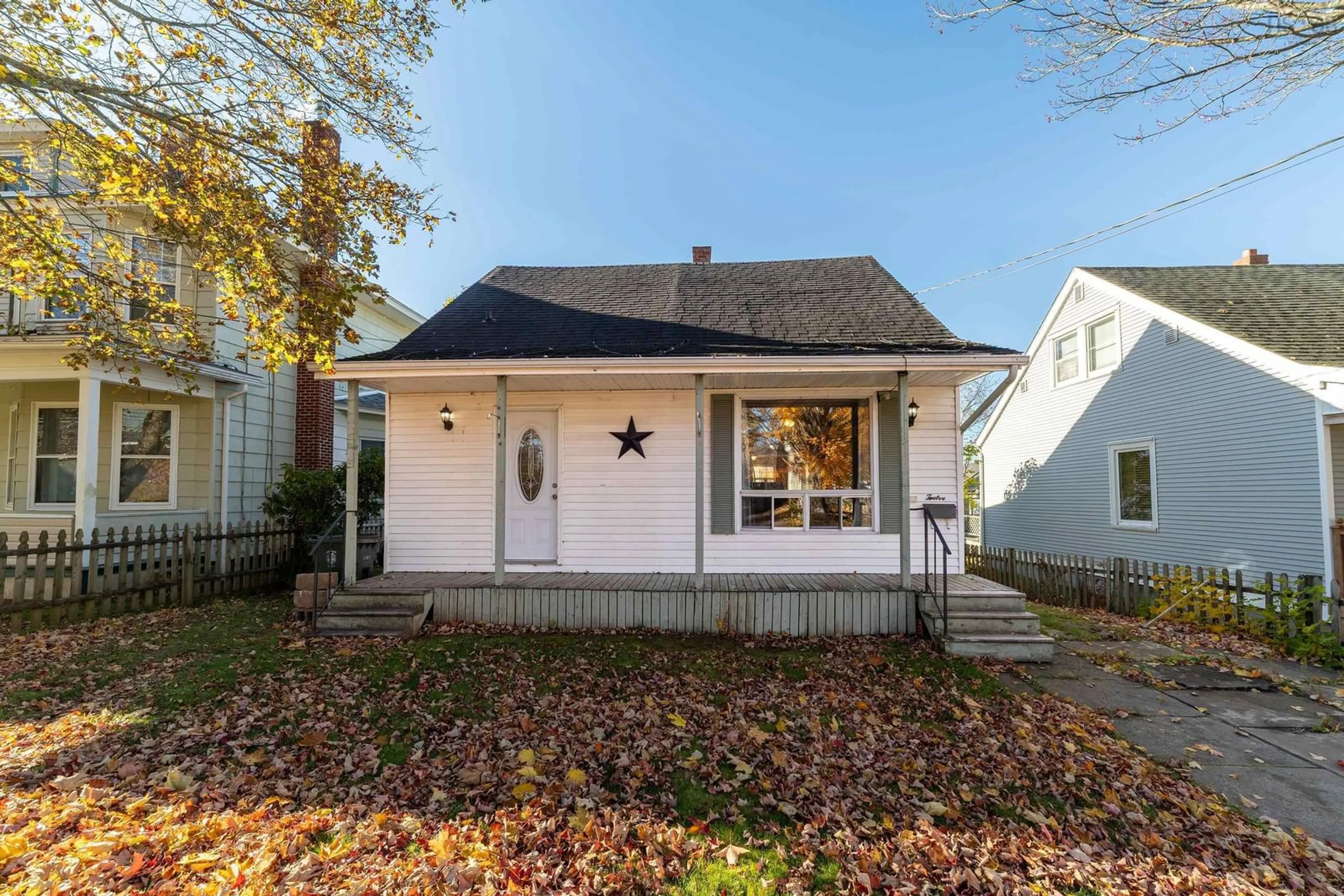 Home with vinyl exterior material, street for 12 Haliburton St, Amherst Nova Scotia B4H 2N7