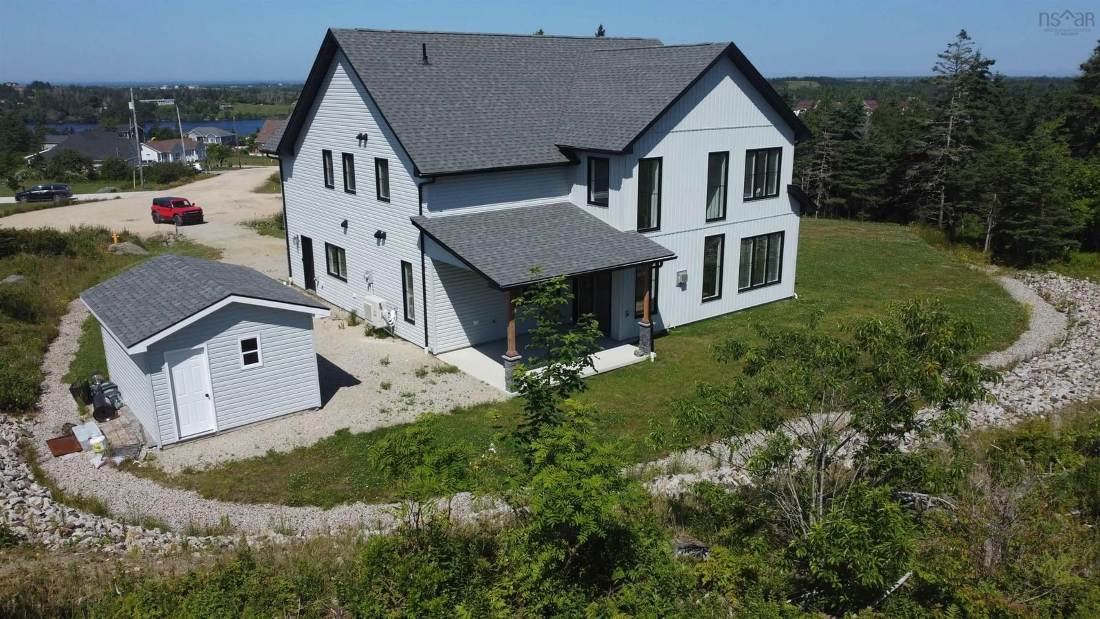 A pic from outside/outdoor area/front of a property/back of a property/a pic from drone, building for 35 Seeland Ave, Brooklyn Nova Scotia B5A 0E2