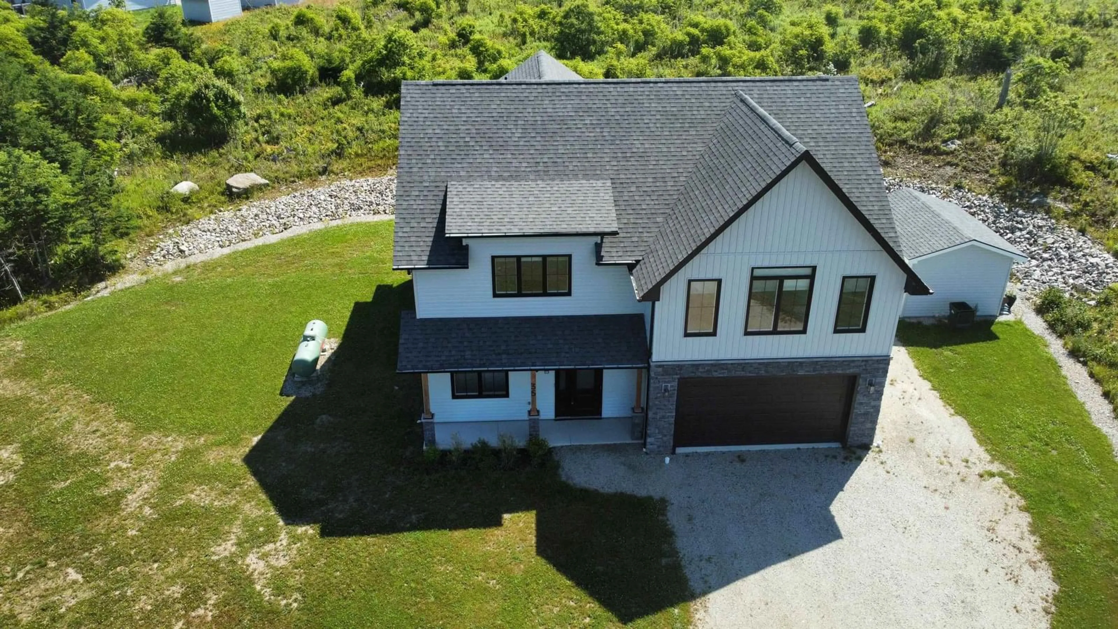 A pic from outside/outdoor area/front of a property/back of a property/a pic from drone, unknown for 35 Seeland Ave, Brooklyn Nova Scotia B5A 0E2