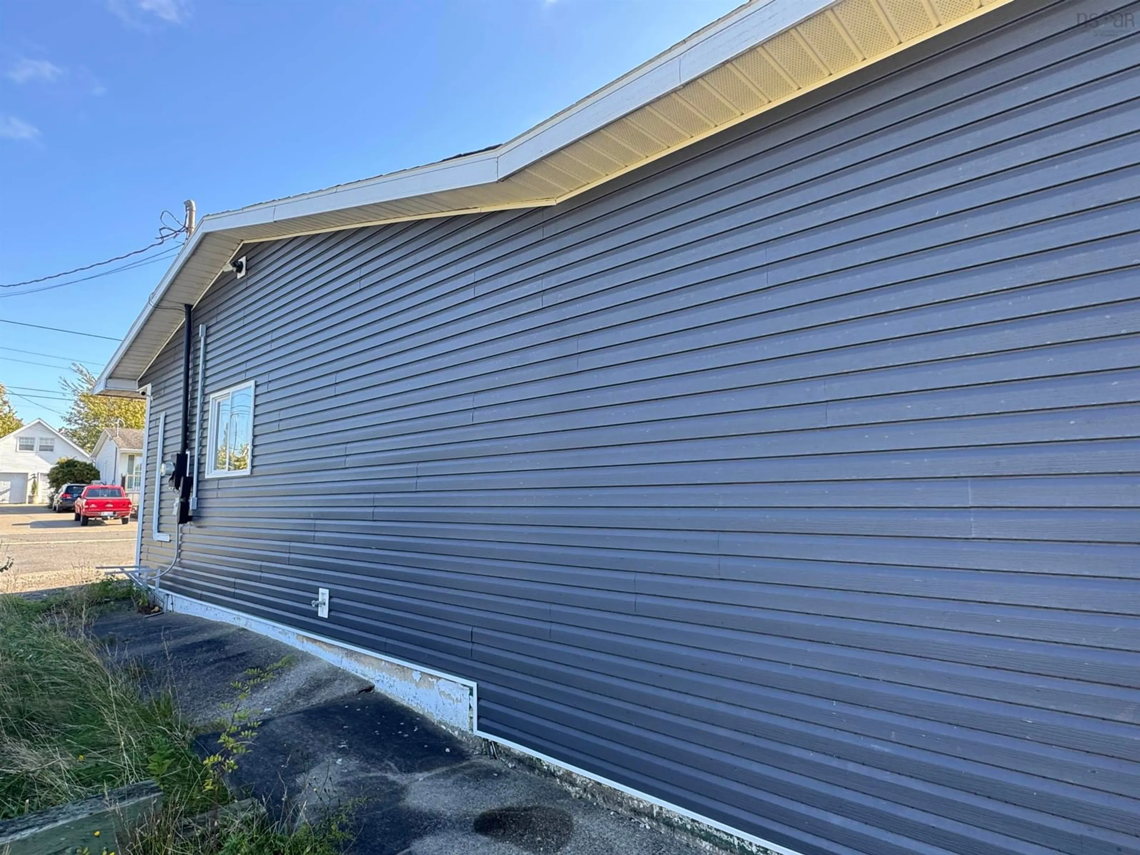Home with vinyl exterior material, building for 2 Cherry St St, Sydney Mines Nova Scotia B1V 3C2