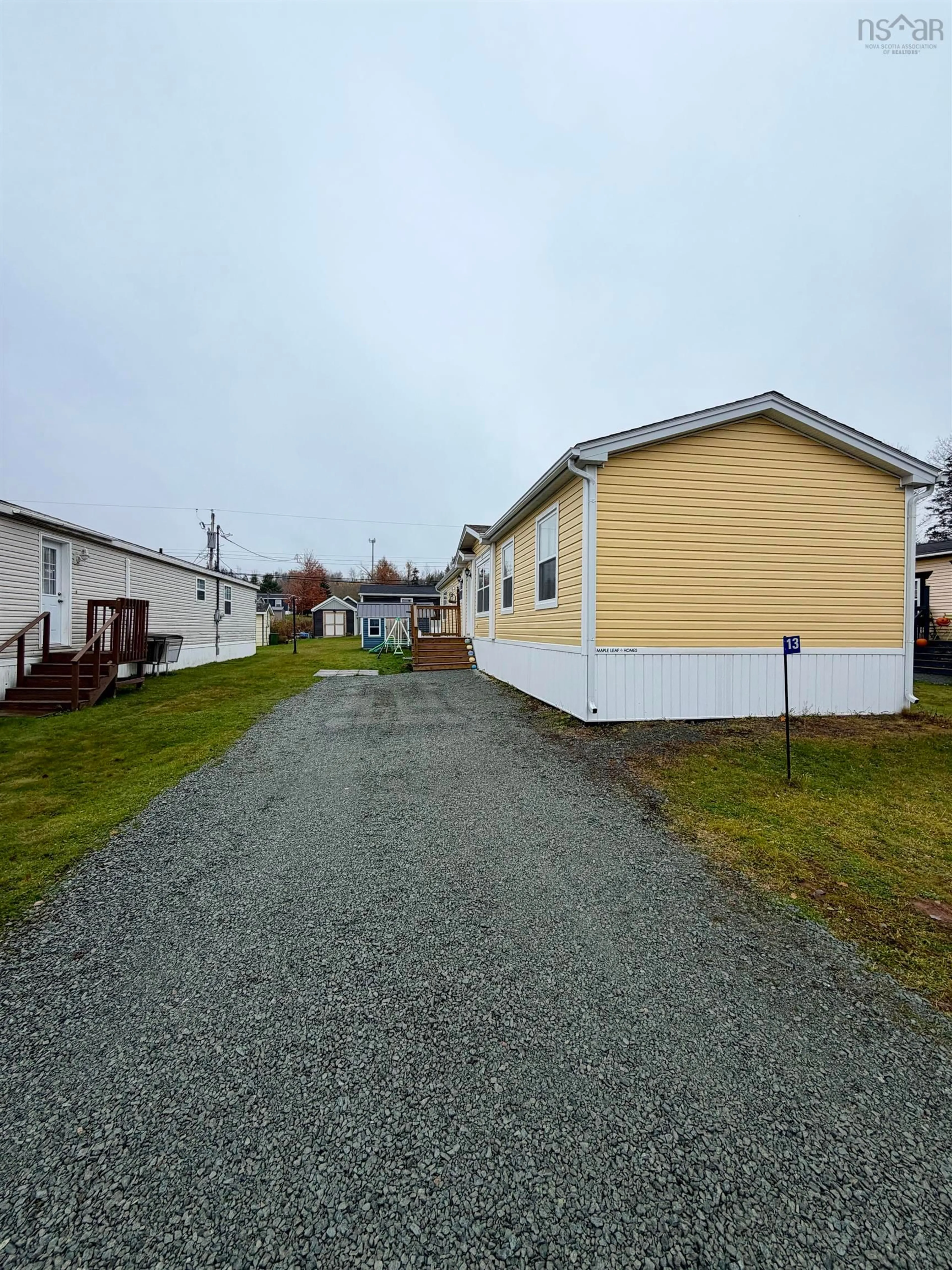 A pic from outside/outdoor area/front of a property/back of a property/a pic from drone, street for 13 Shawndale Dr, Salmon River Nova Scotia B2N 5J5