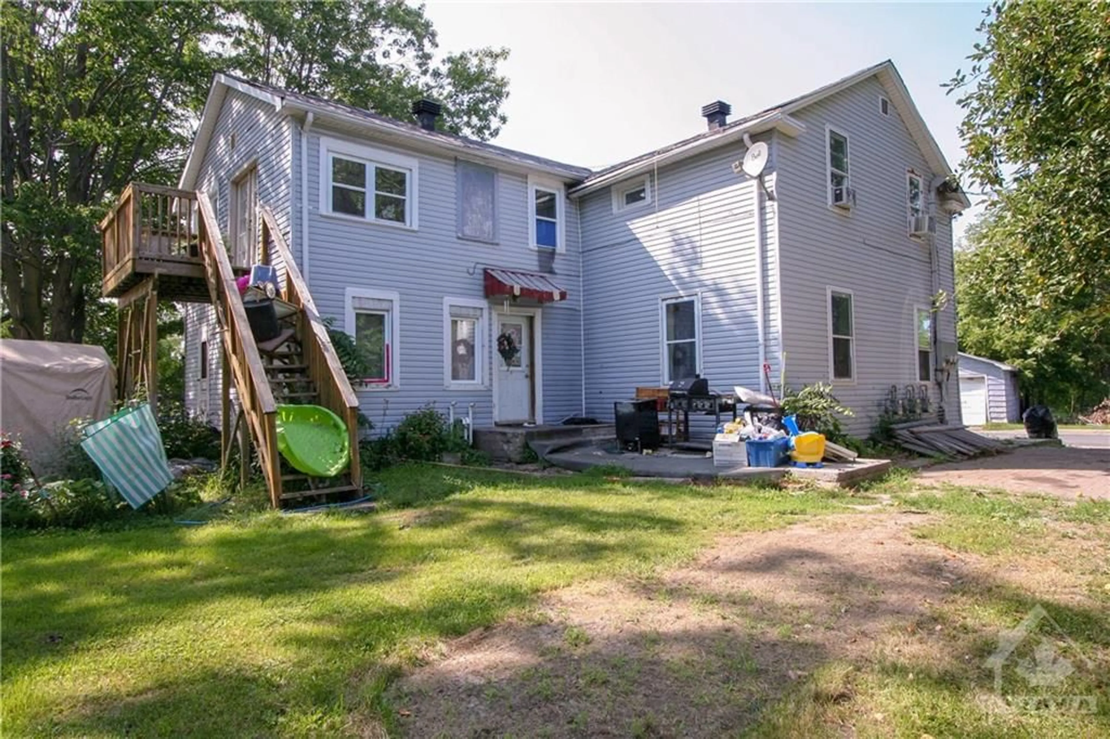 Frontside or backside of a home, the fenced backyard for 78 MILL St, Chesterville Ontario K0C 1H0