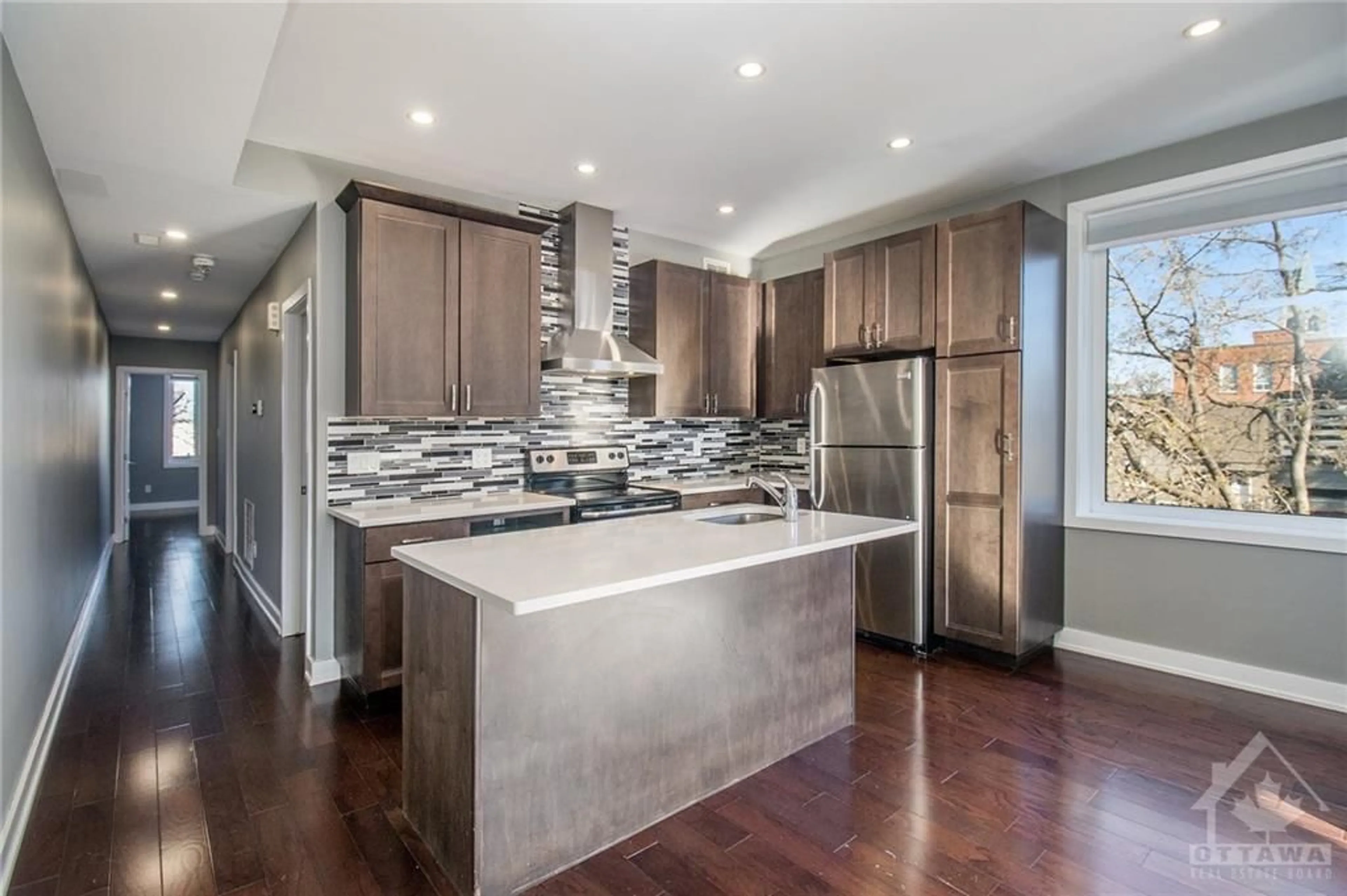 Open concept kitchen for 453 BOOTH St, Ottawa Ontario K1R 7K9