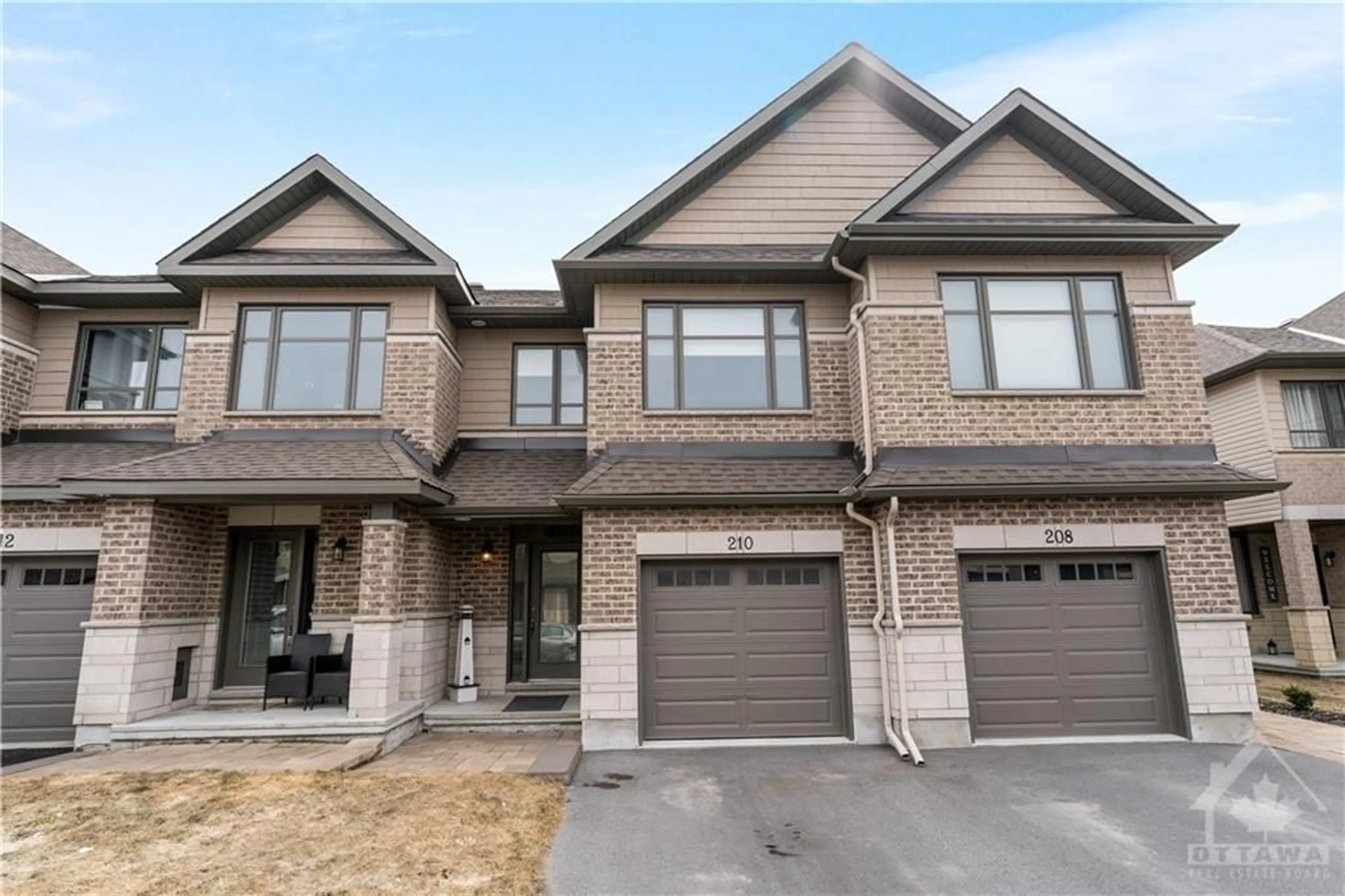 Home with brick exterior material for 210 PURCHASE Cres, Ottawa Ontario K2S 1P8