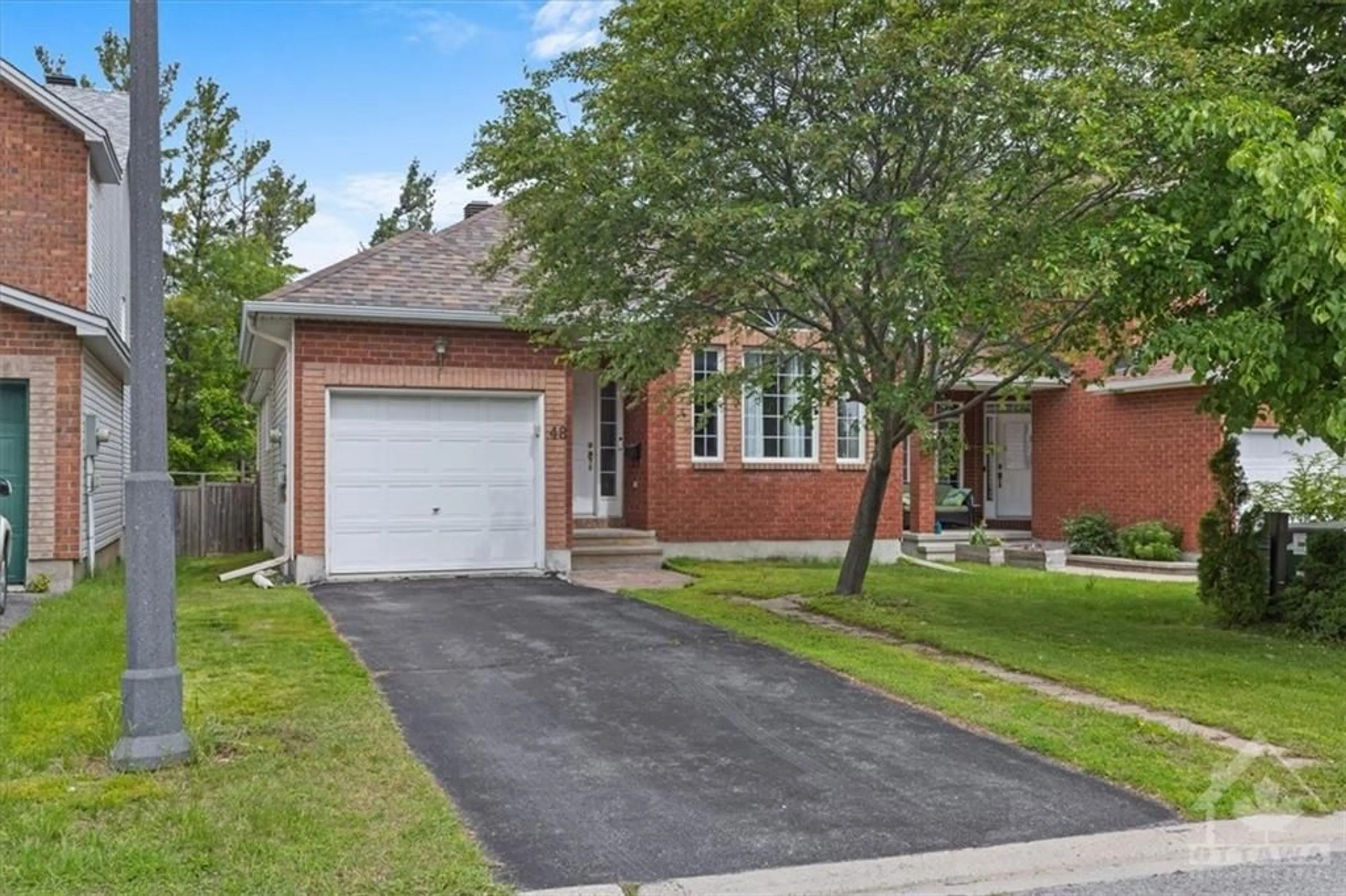 Frontside or backside of a home for 48 MARICONA Way, Ottawa Ontario K2T 1H2