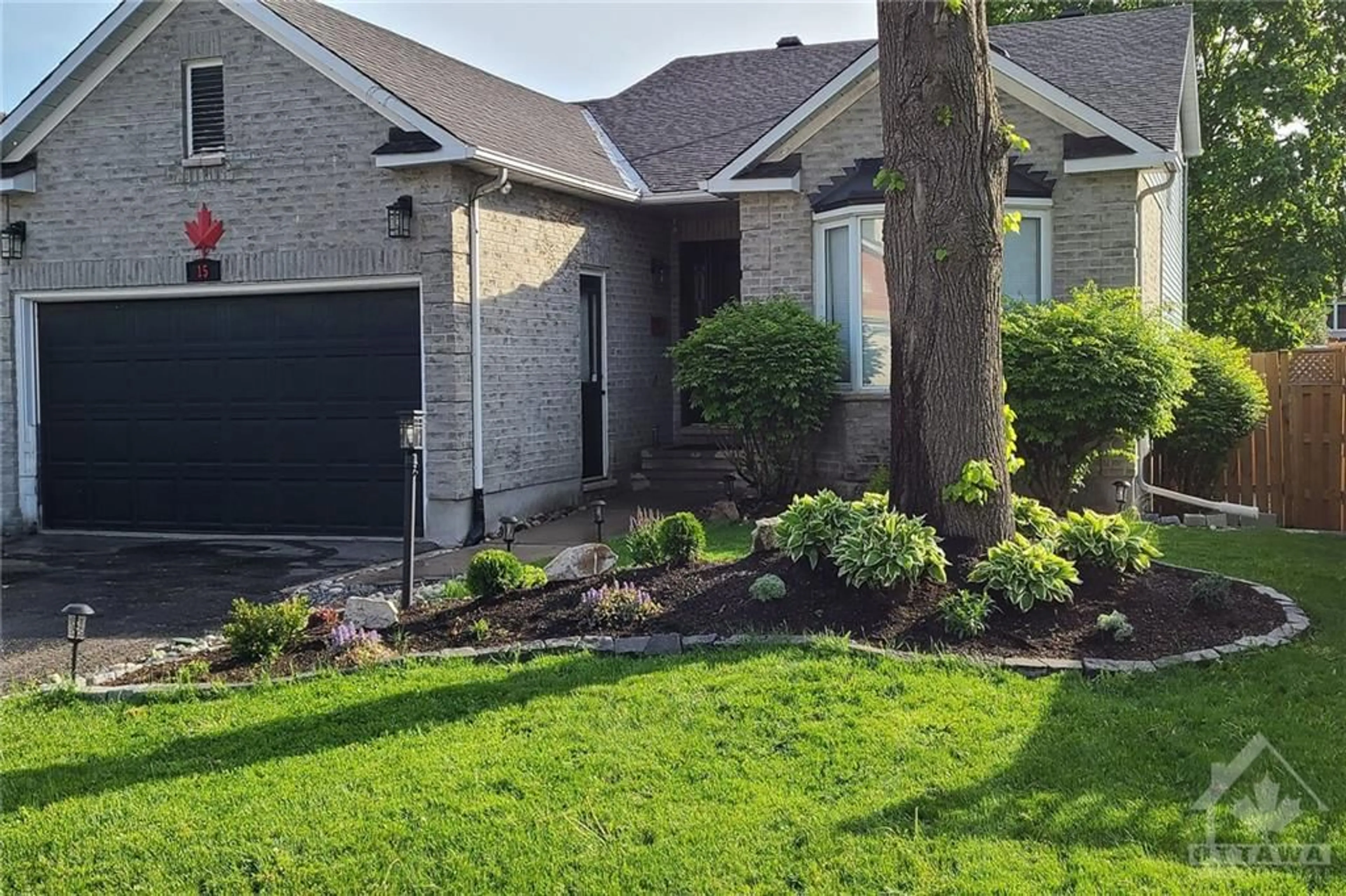 Frontside or backside of a home for 15 WINDBROOK Cres, Ottawa Ontario K2M 1L1