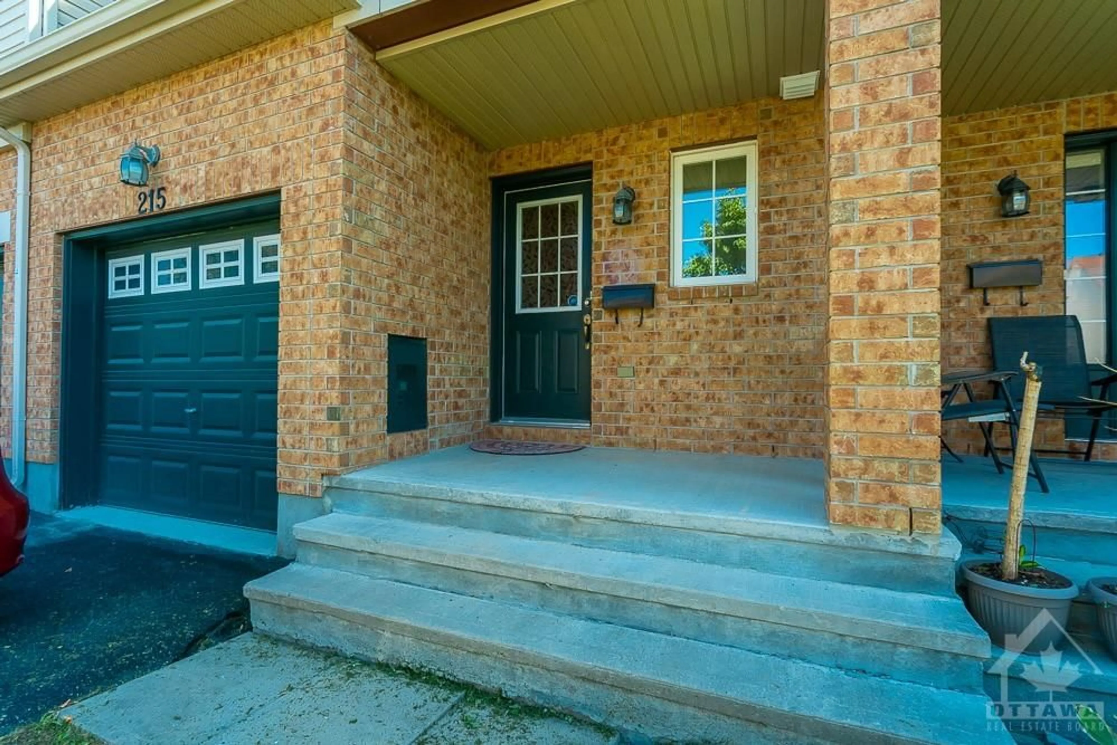 Home with brick exterior material for 215 MACOUN Cir, Ottawa Ontario K1T 0H9