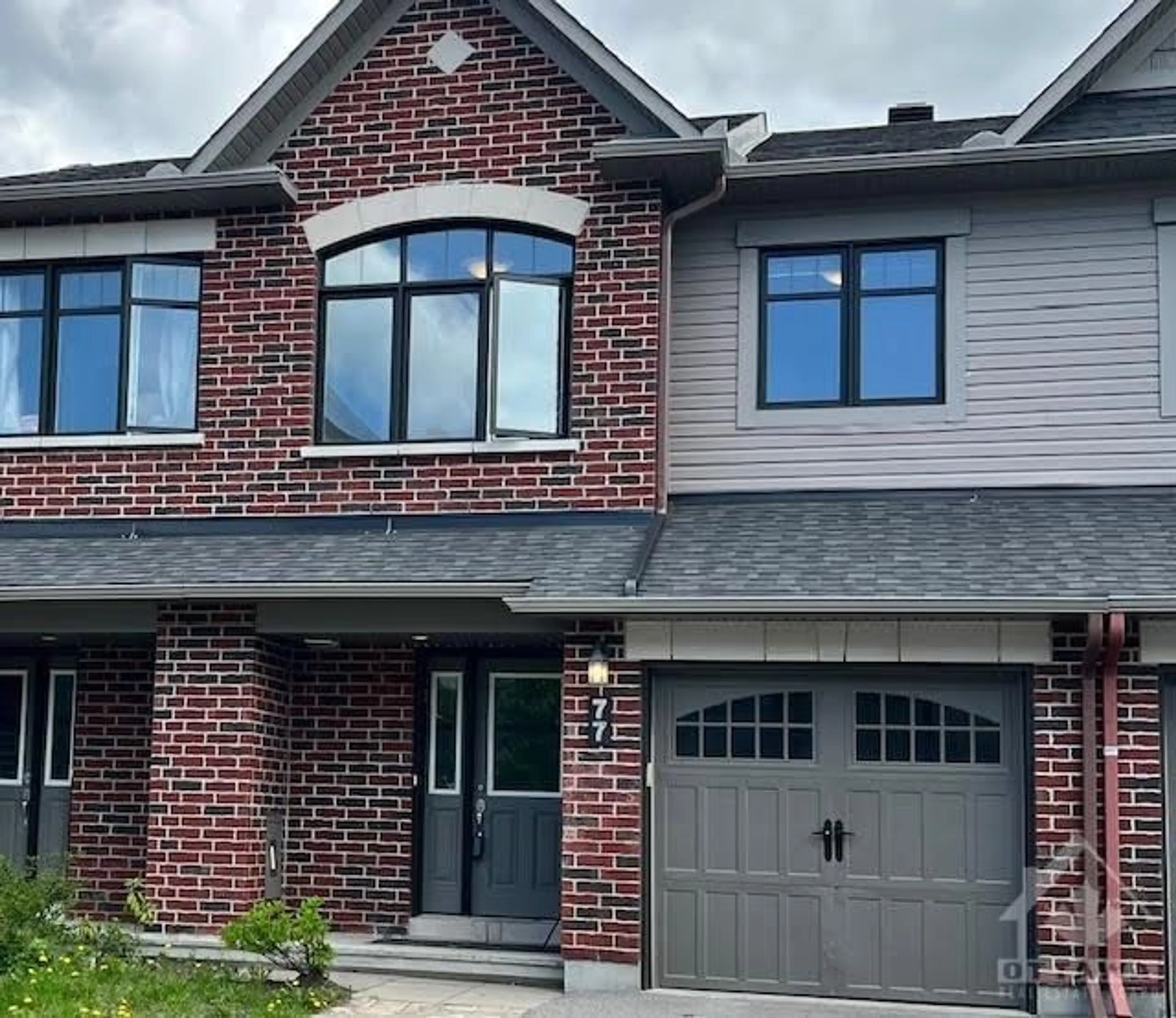 Home with brick exterior material for 77 FALLENGALE Cres, Kanata Ontario K2T 0L2