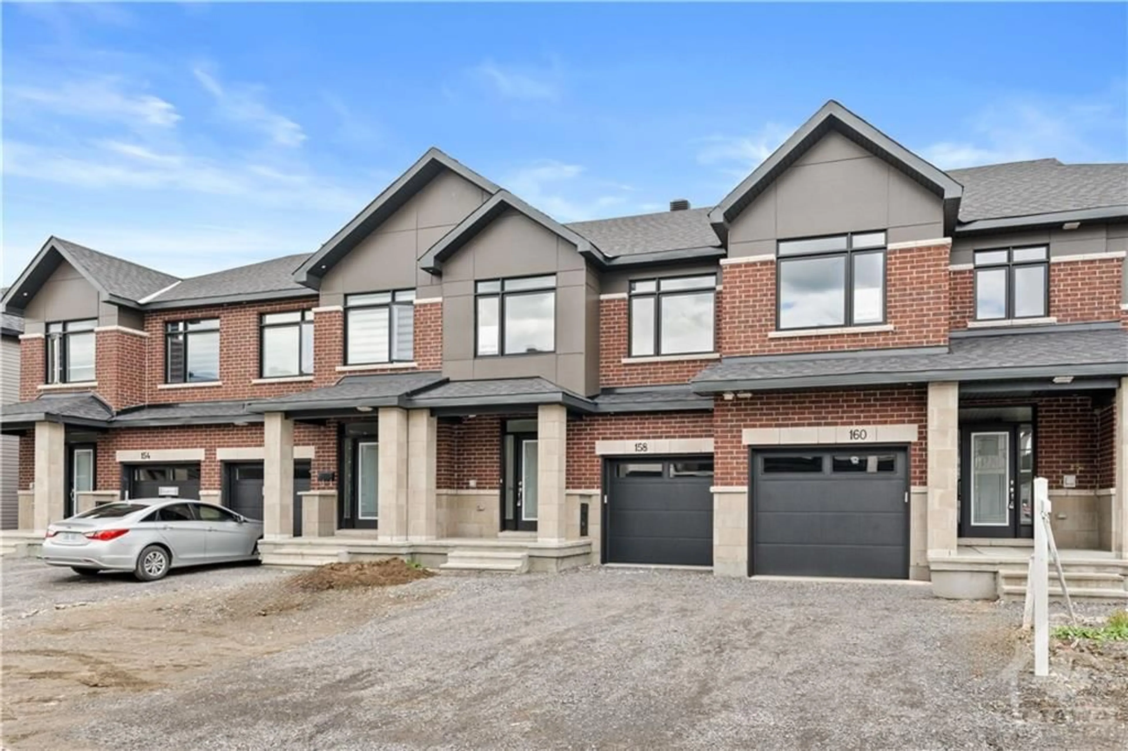 Home with brick exterior material for 158 LEMON LEAF Lane, Ottawa Ontario K1T 0X5