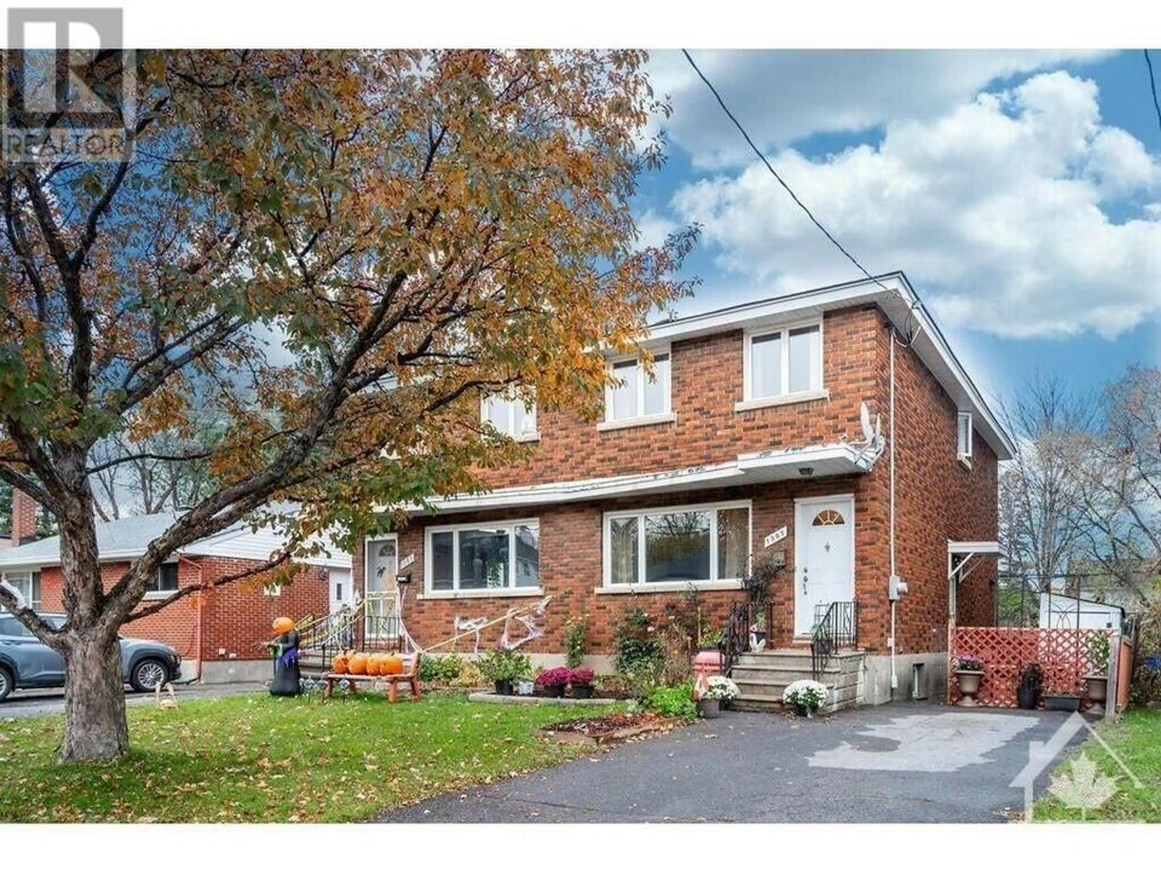 Home with brick exterior material for 1387-1389 RAVEN Ave, Ottawa Ontario K1Z 7Y5