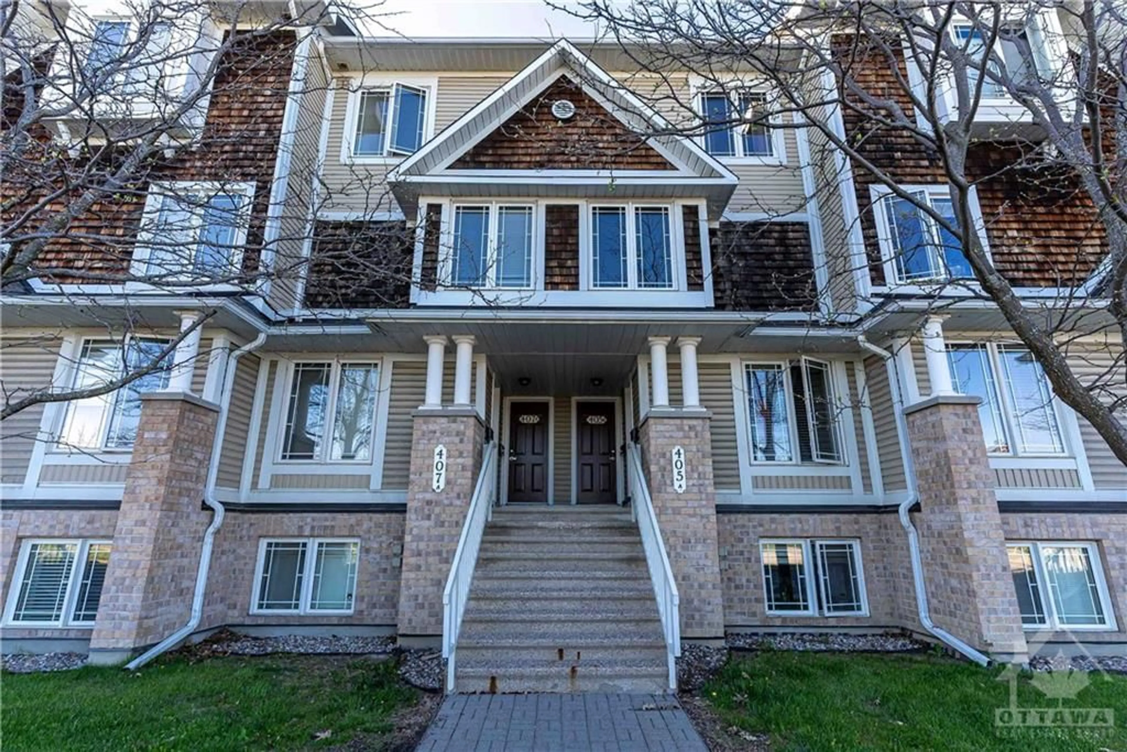 A pic from exterior of the house or condo for 405 CHAPMAN MILLS Dr #B, Ottawa Ontario K2J 0M7