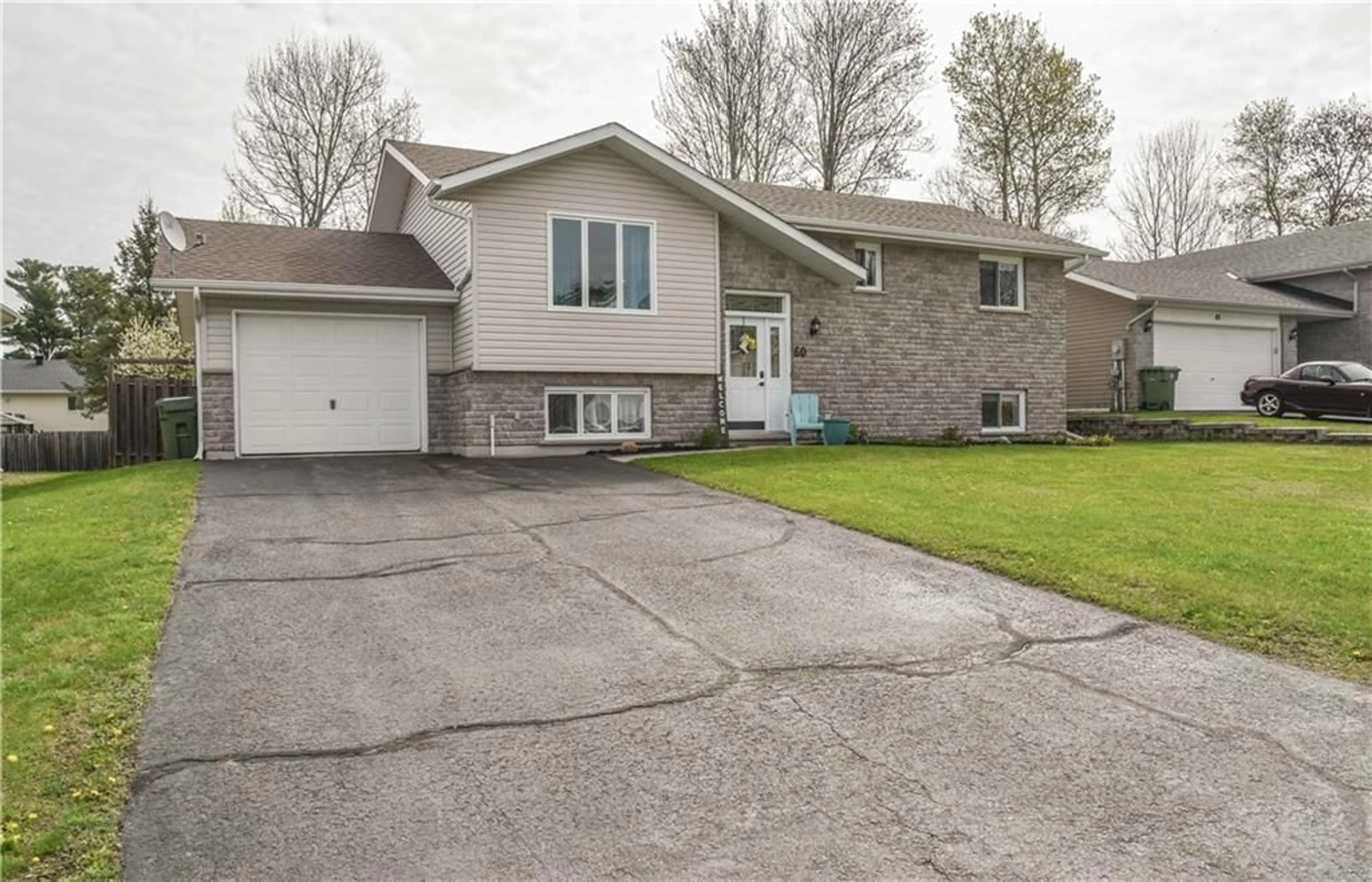 Frontside or backside of a home for 60 SPRUCE St, Petawawa Ontario K8H 3N6