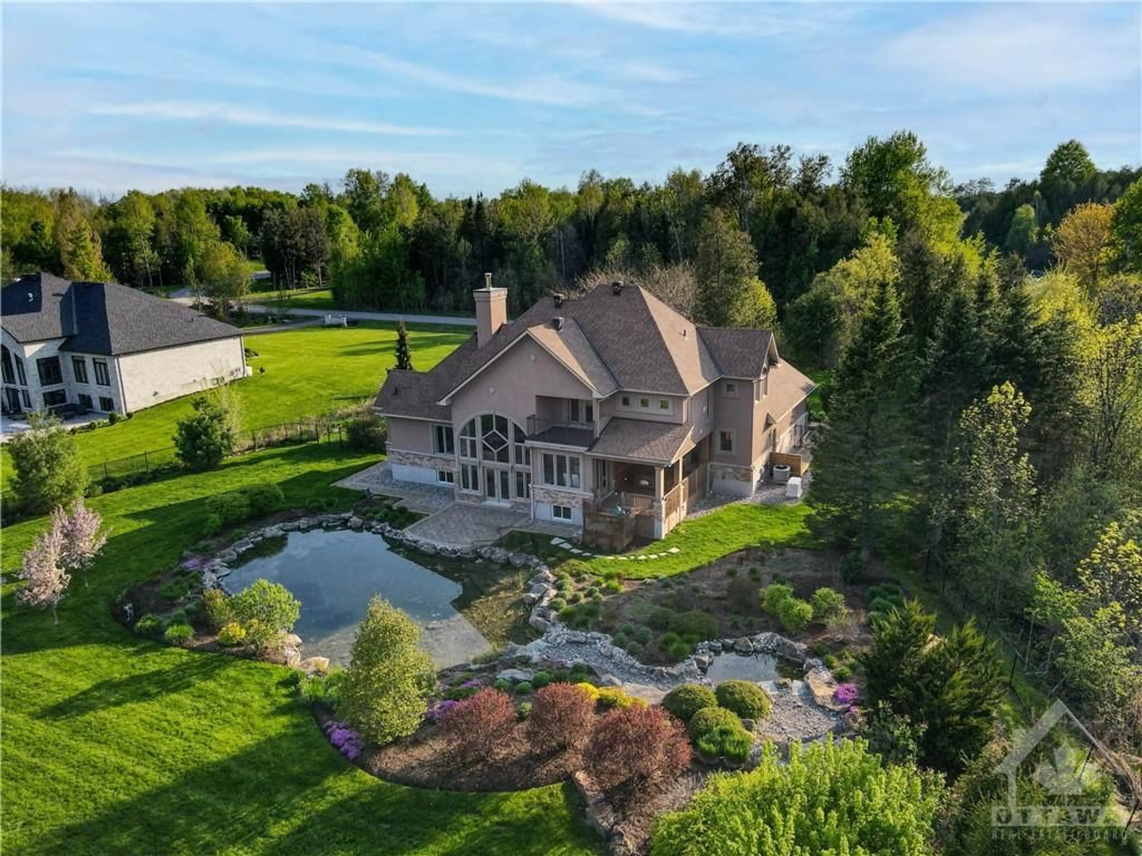Frontside or backside of a home for 5844 LONGHEARTH Way, Manotick Ontario K4M 1M1