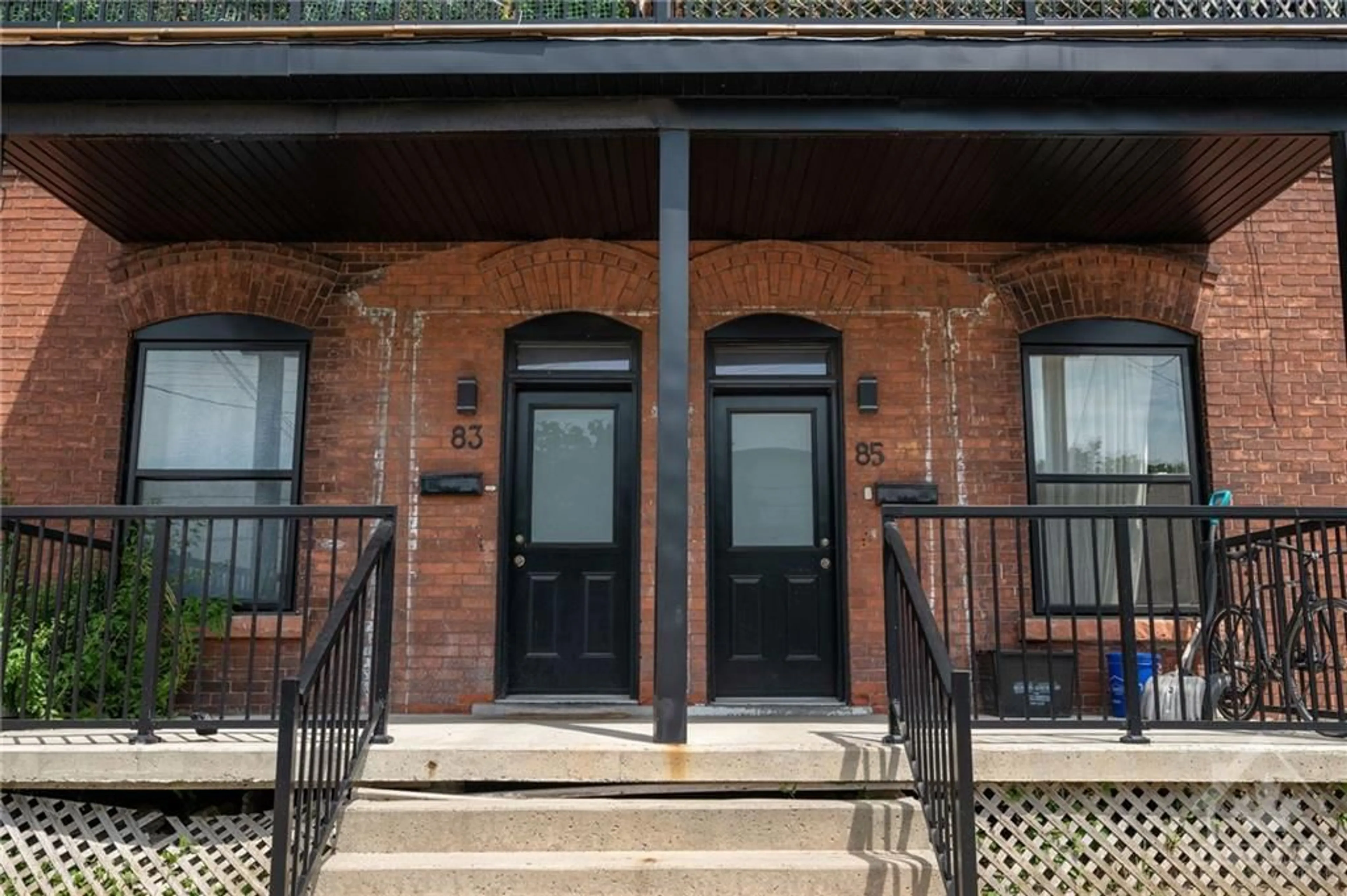Home with brick exterior material for 83-85 LEBRETON St, Ottawa Ontario K1R 7H3