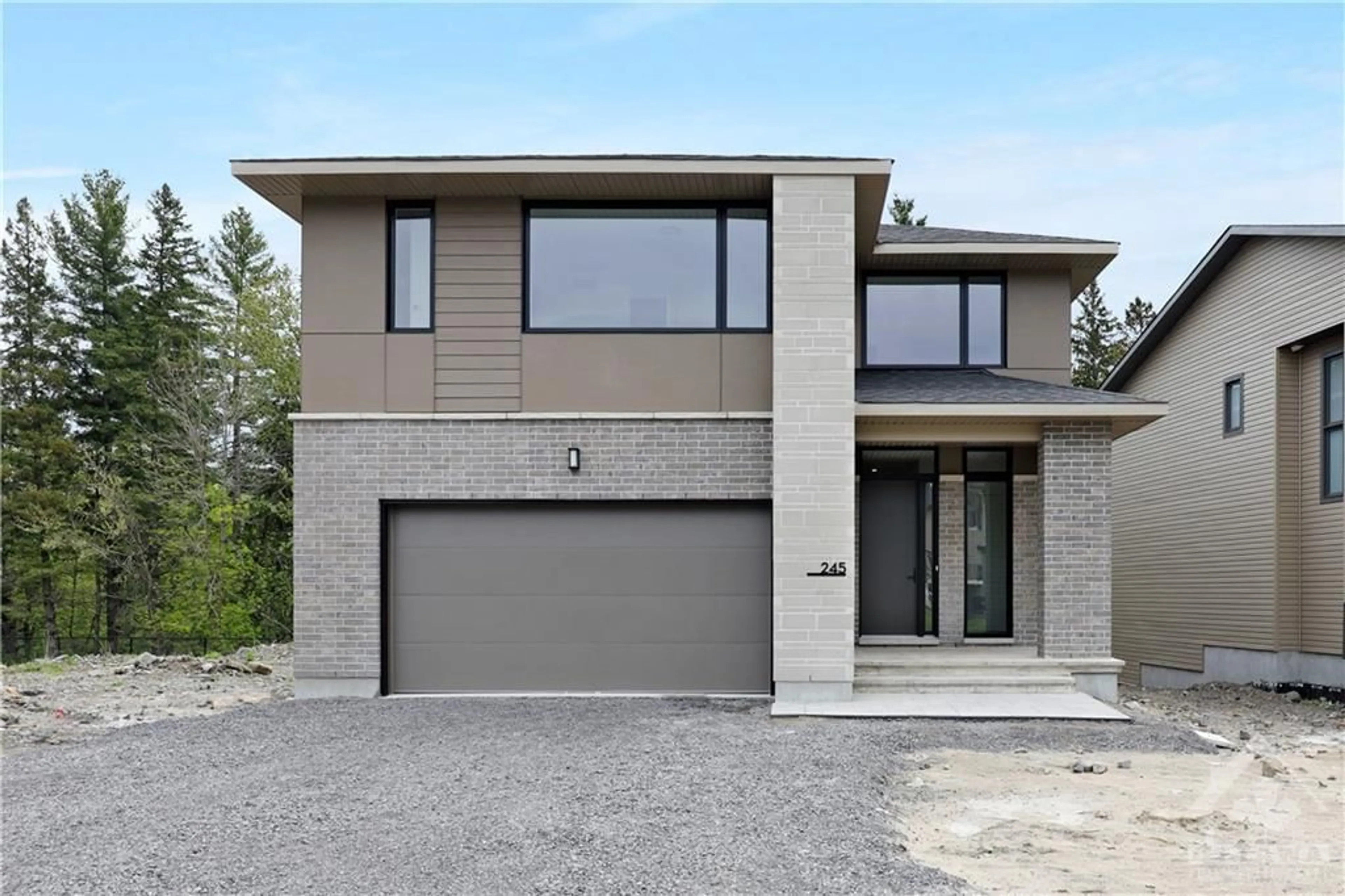 Home with brick exterior material for 245 KETCHIKAN Cres, Ottawa Ontario K2T 0L7