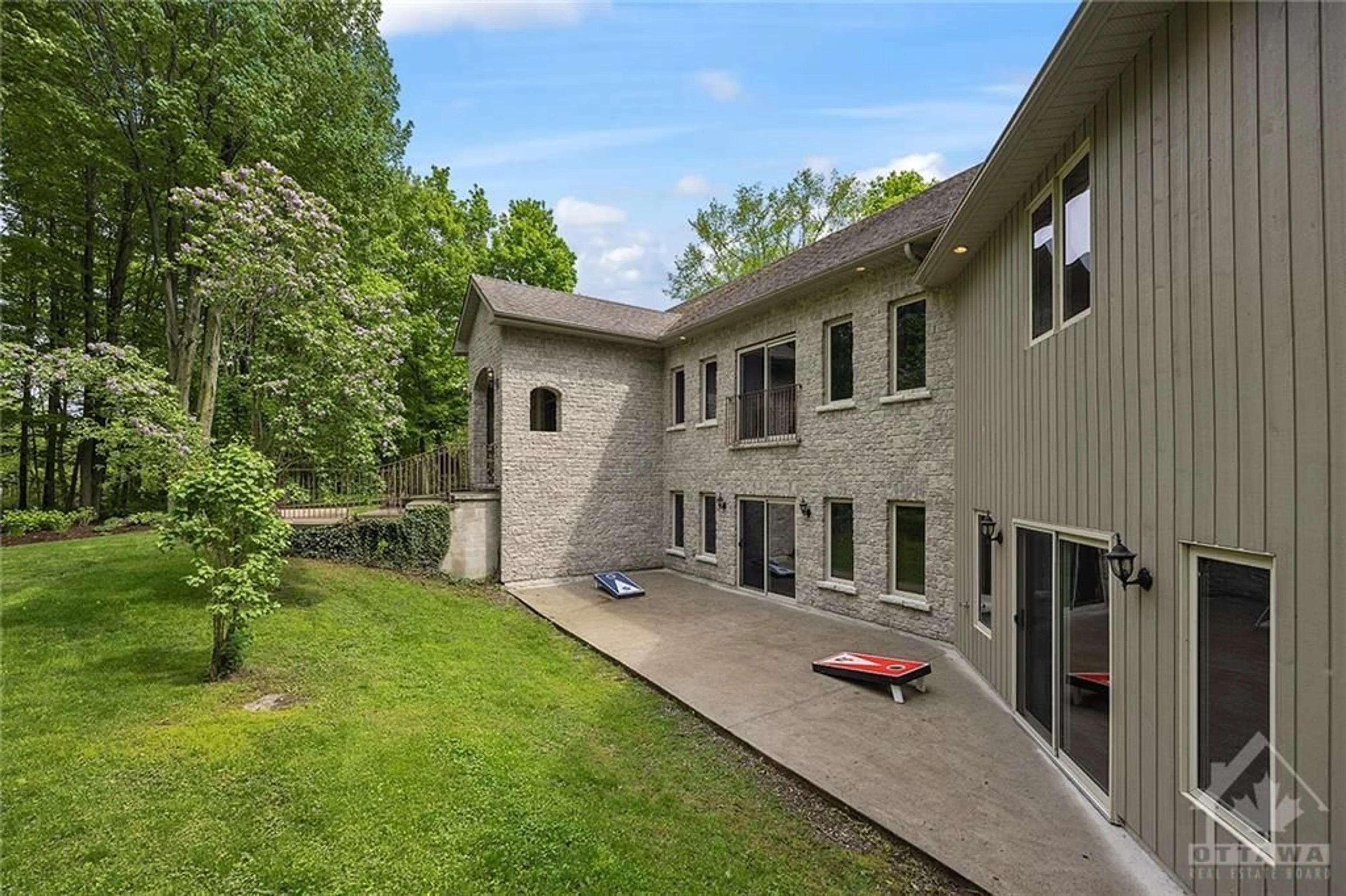 Frontside or backside of a home, the fenced backyard for 2771 BEAR CREEK Rd, Inverary Ontario K0A 1X0