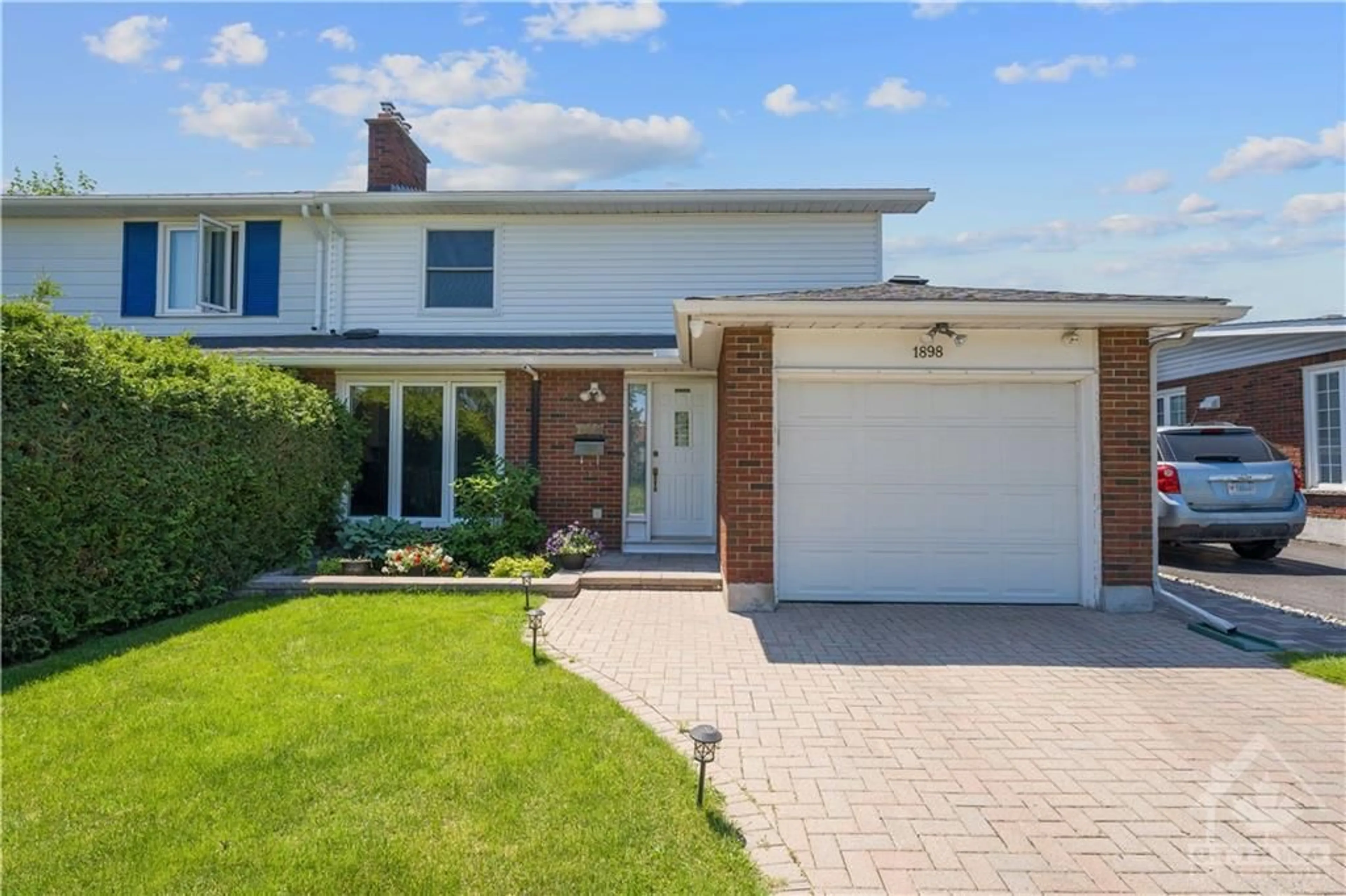 Home with brick exterior material for 1898 ELMRIDGE Dr, Ottawa Ontario K1J 6R7