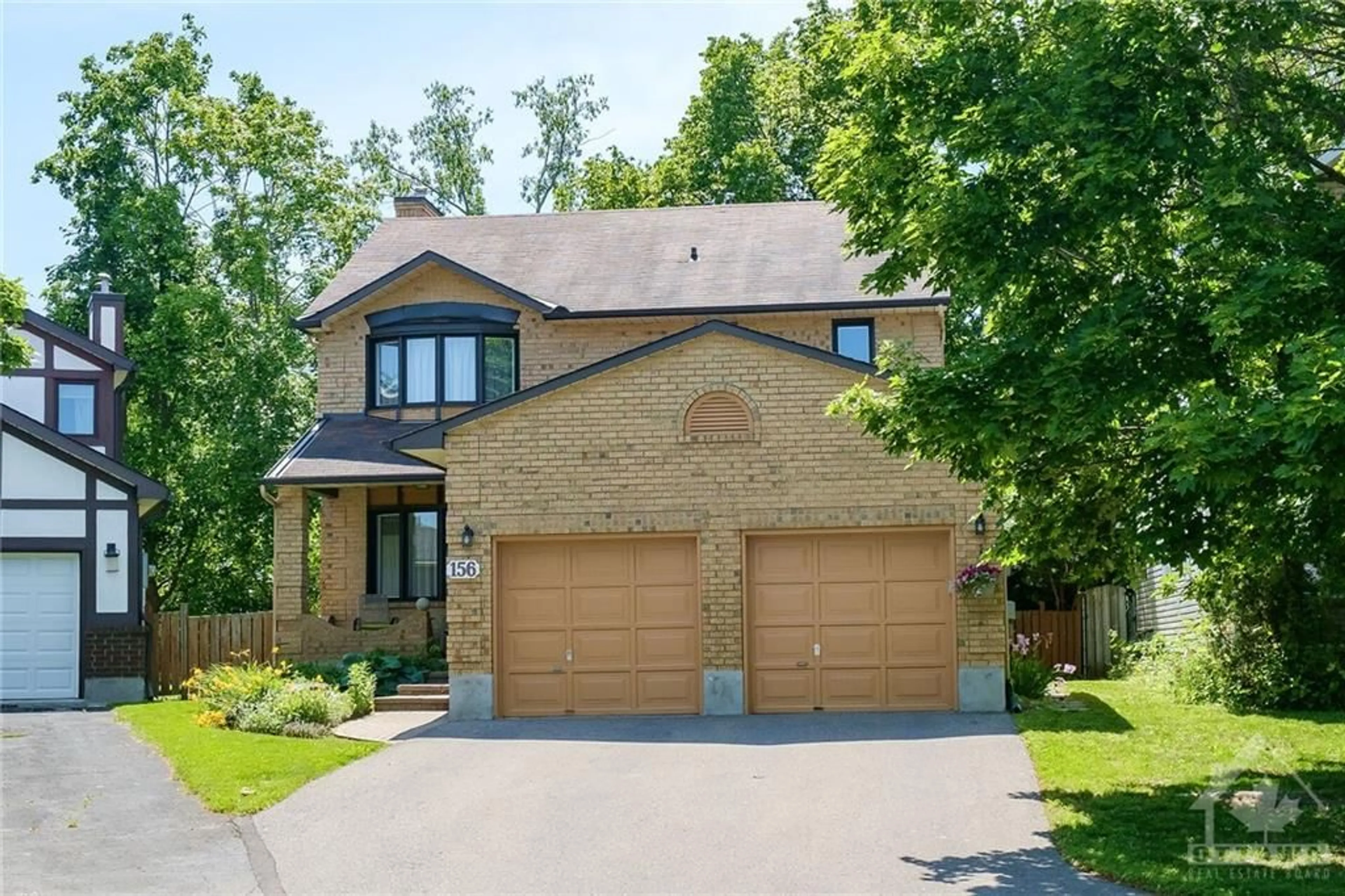 Home with brick exterior material for 156 TWYFORD St, Ottawa Ontario K1V 0V7