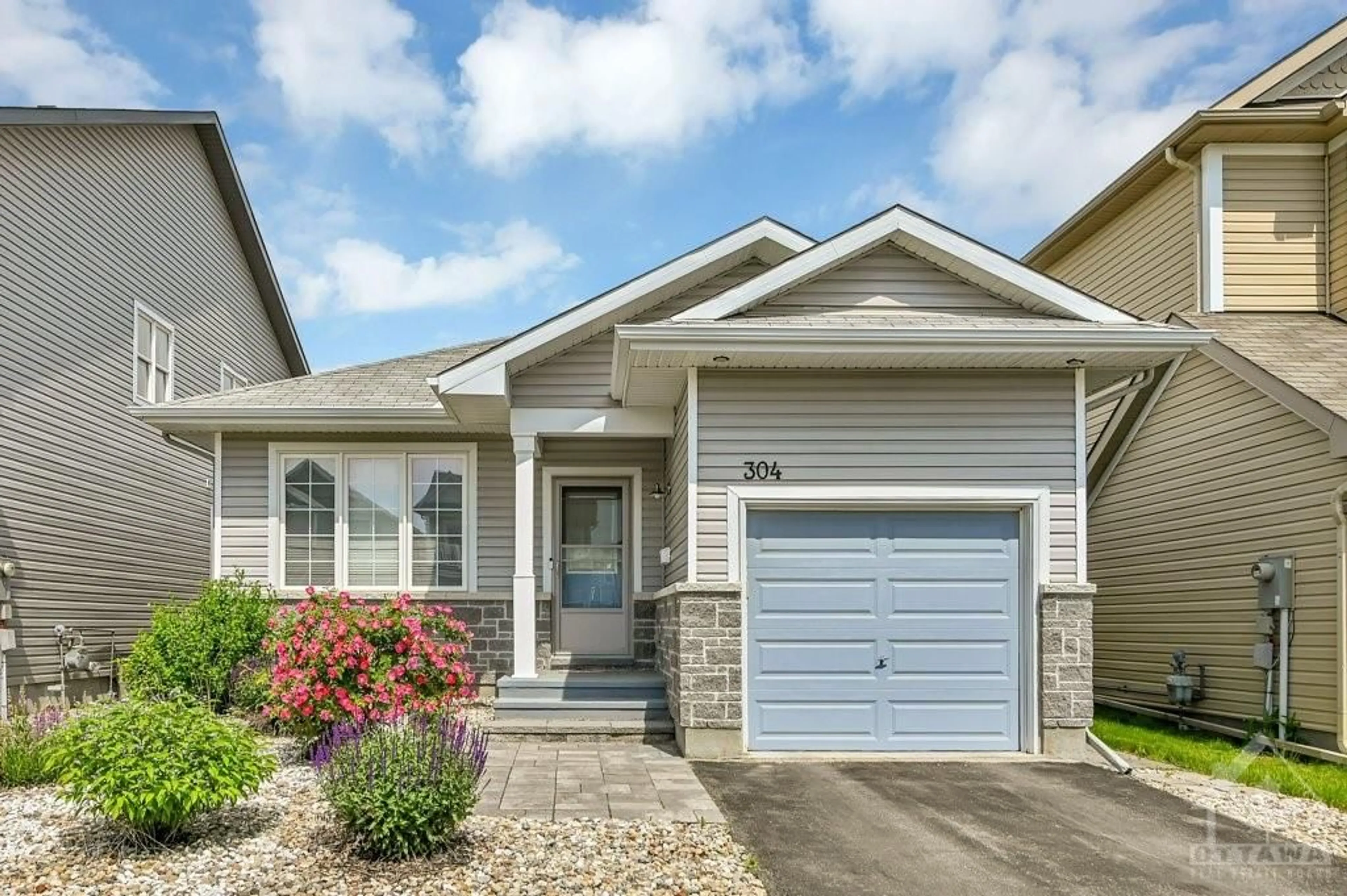 Home with vinyl exterior material for 304 BOBOLINK Ridge, Ottawa Ontario K2V 0B1