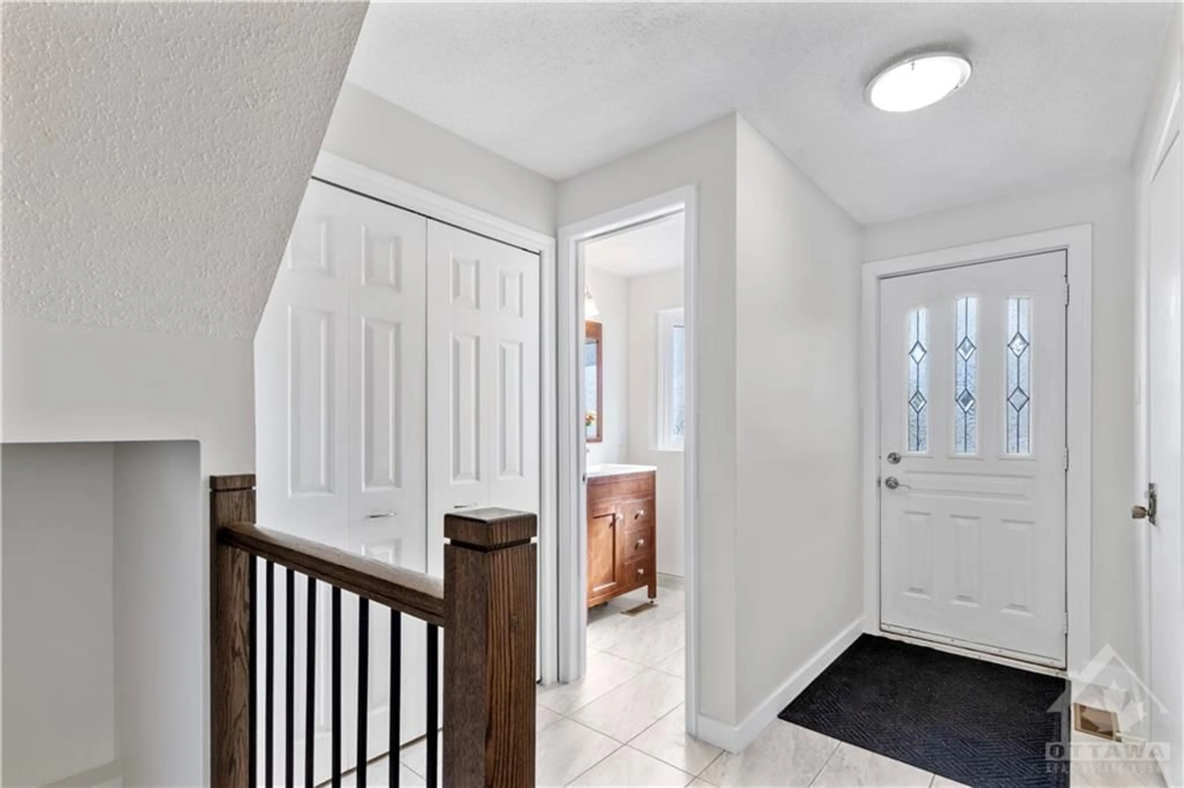 Indoor entryway, wood floors for 34 SHADETREE Cres, Ottawa Ontario K2E 7R2