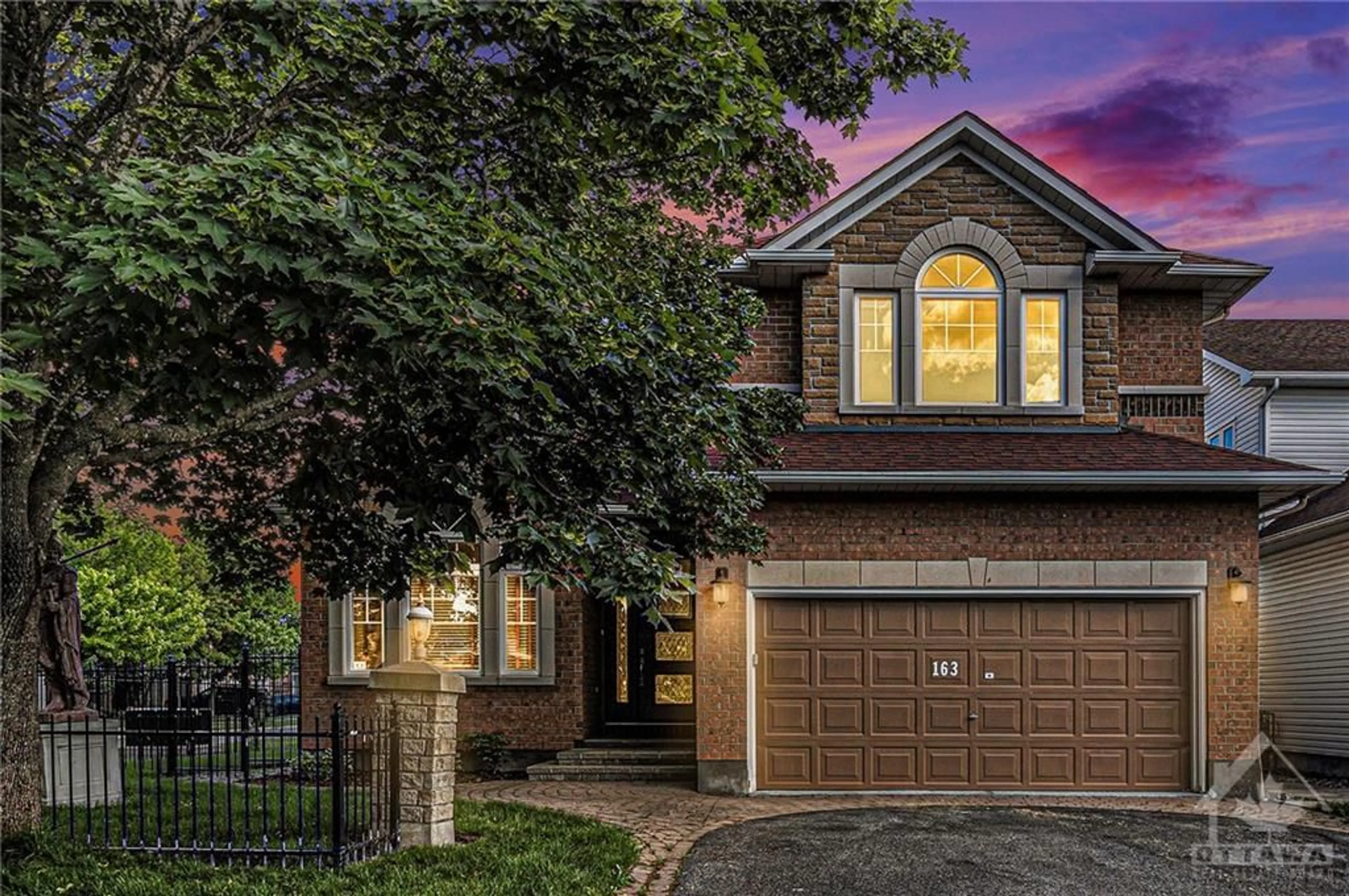 Home with brick exterior material for 163 YOHO Dr, Kanata Ontario K2M 2V4