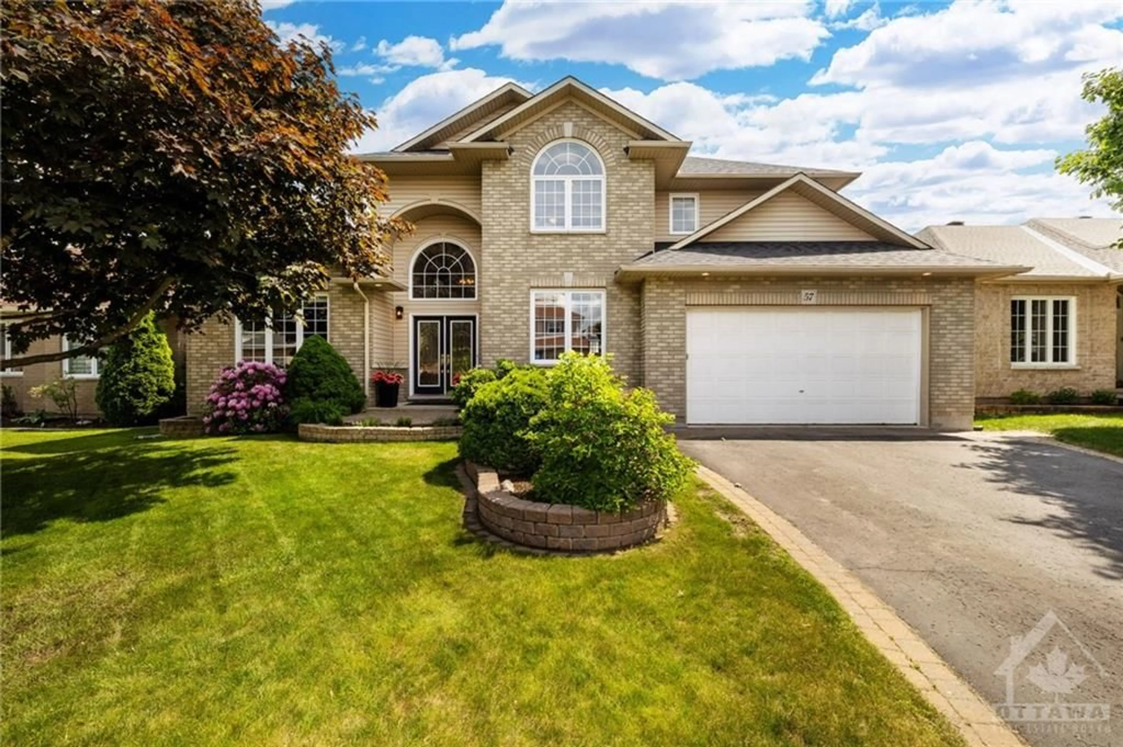 Frontside or backside of a home for 57 CINNABAR Way, Stittsville Ontario K2S 1Y9
