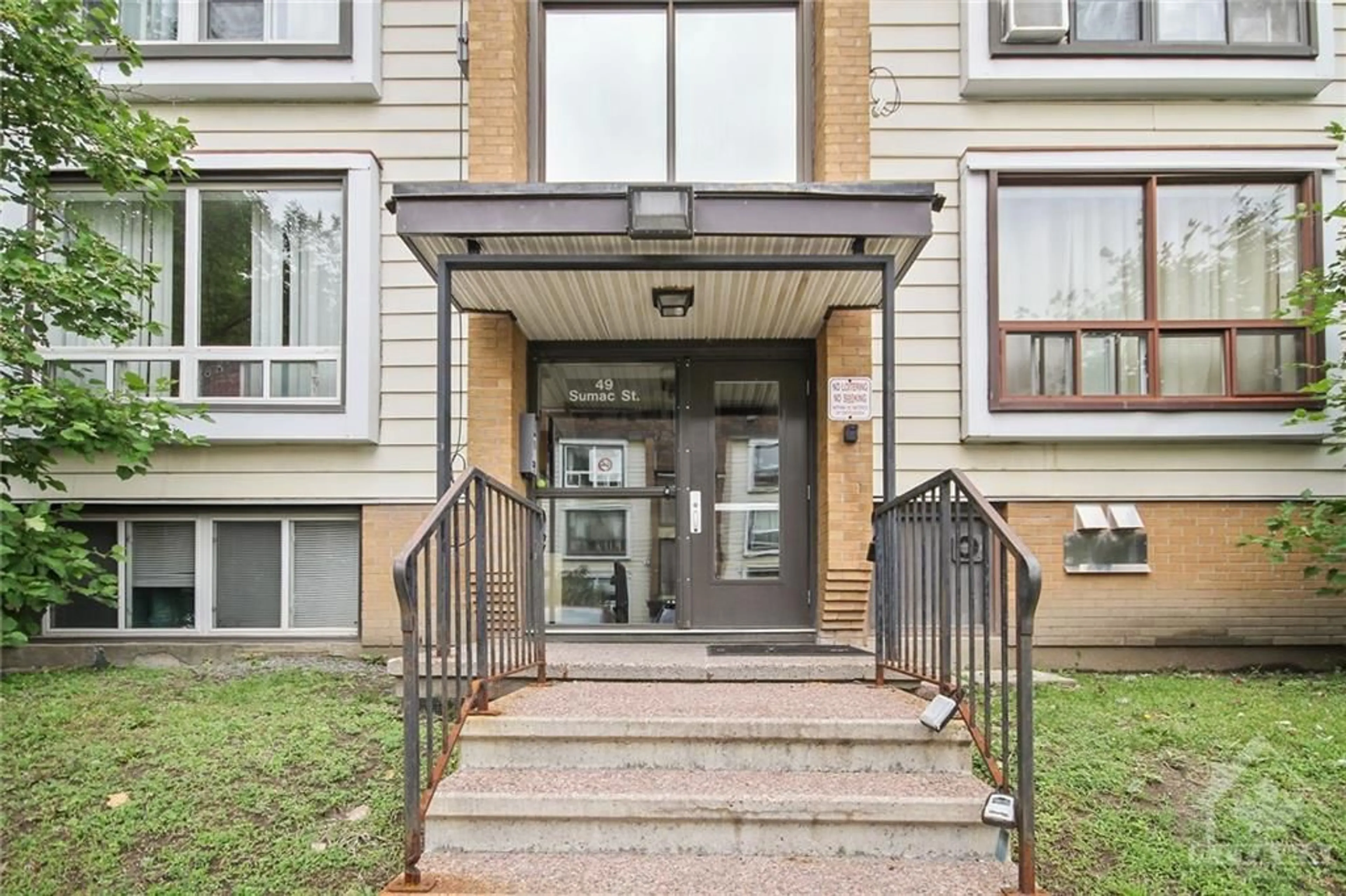 A pic from exterior of the house or condo for 49 SUMAC St #11, Ottawa Ontario K1J 7T7