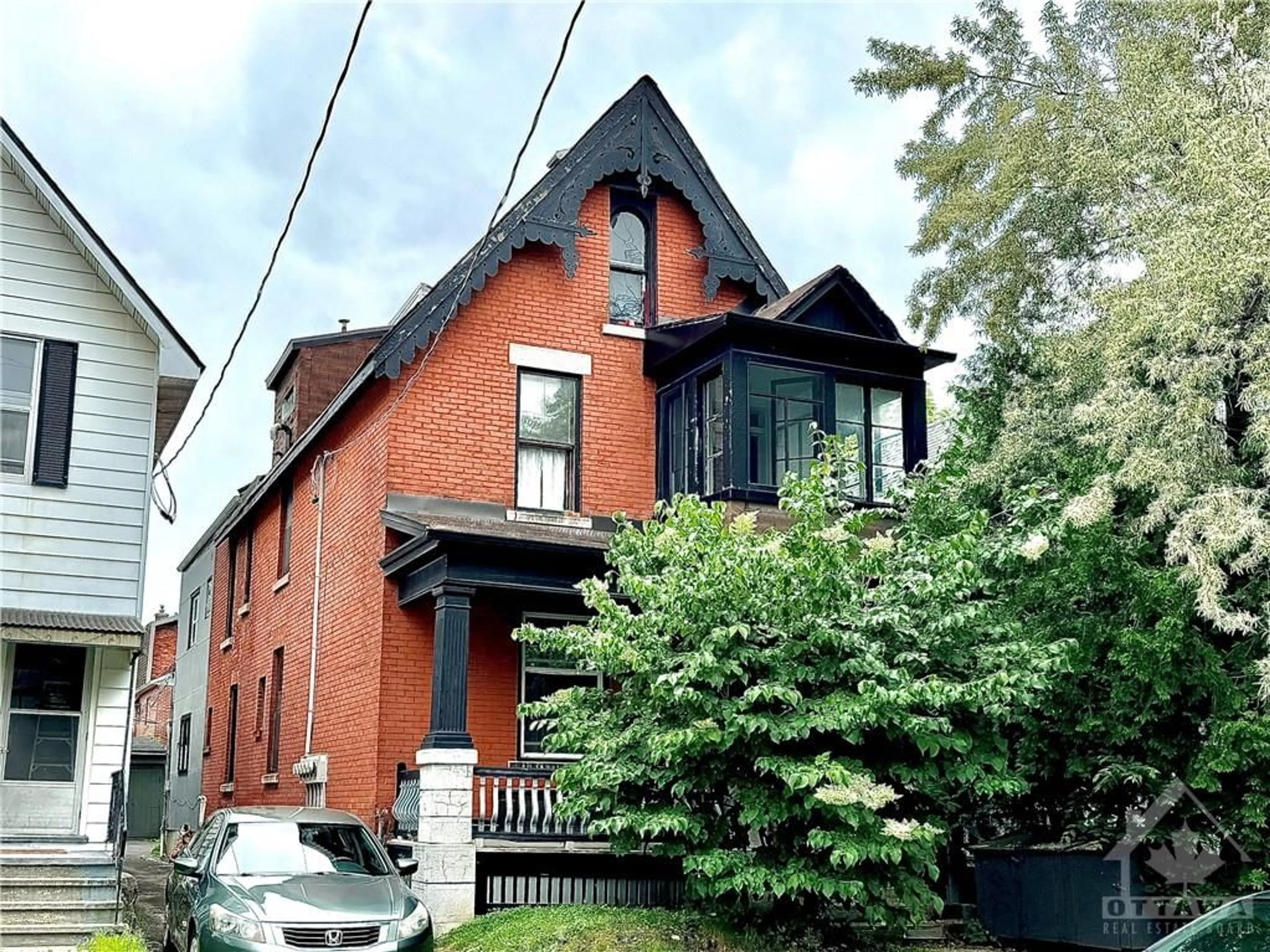 Frontside or backside of a home for 668 COOPER St, Ottawa Ontario K1R 5J4