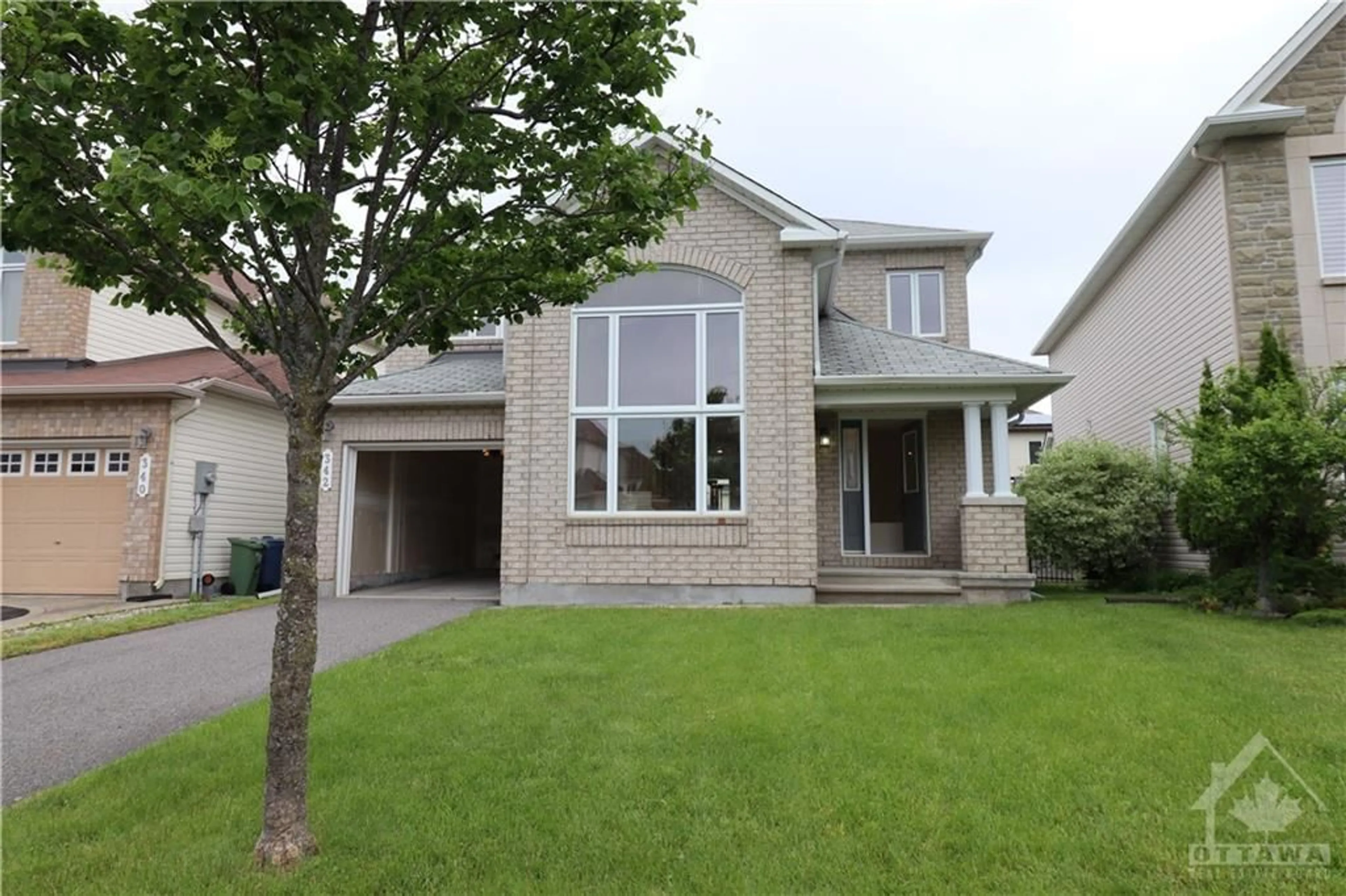 Frontside or backside of a home for 342 OAKCREST Way, Ottawa Ontario K4A 0S5