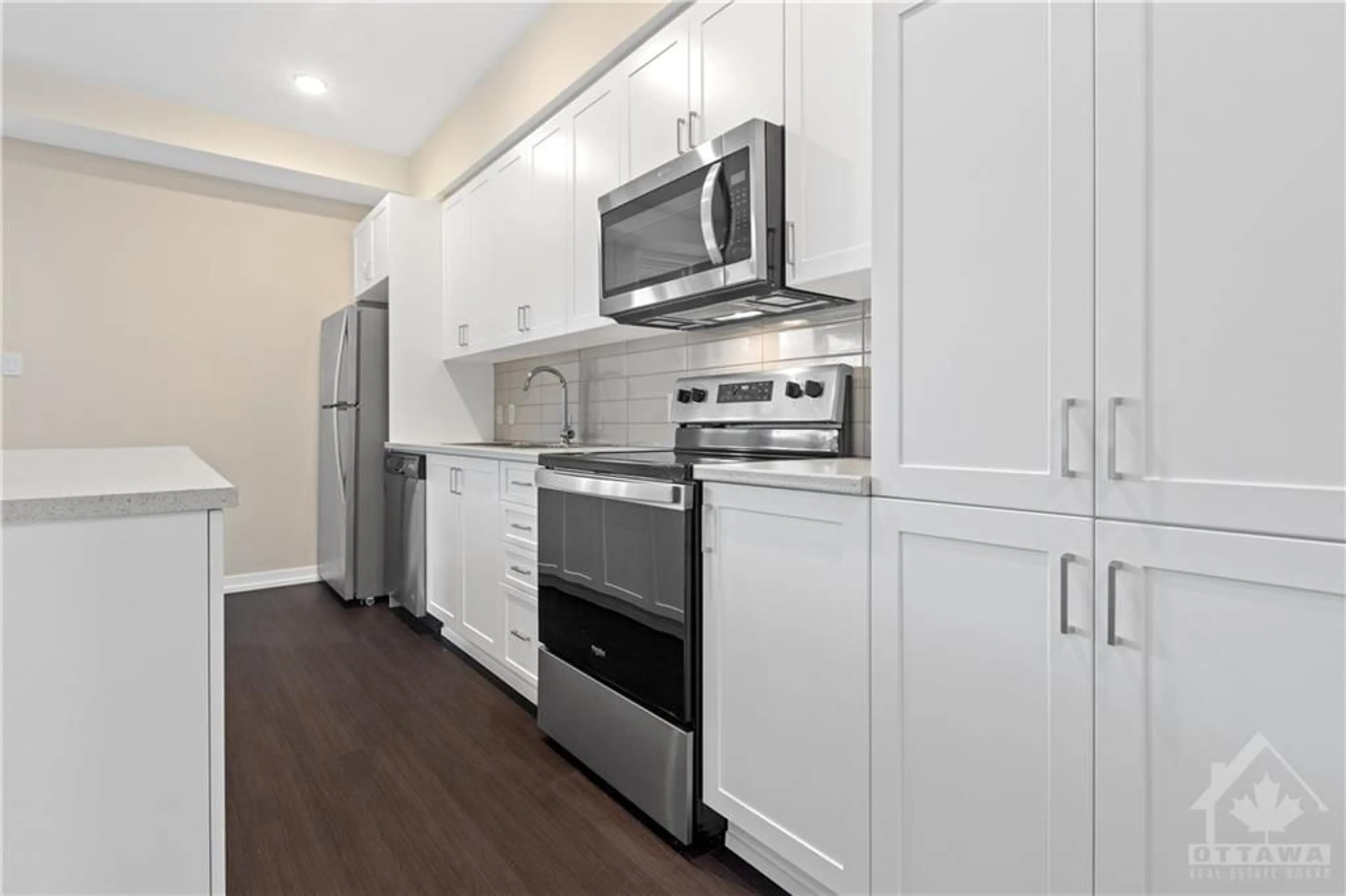 Standard kitchen, wood floors for 225 CITIPLACE Dr #G, Ottawa Ontario K2E 0A8