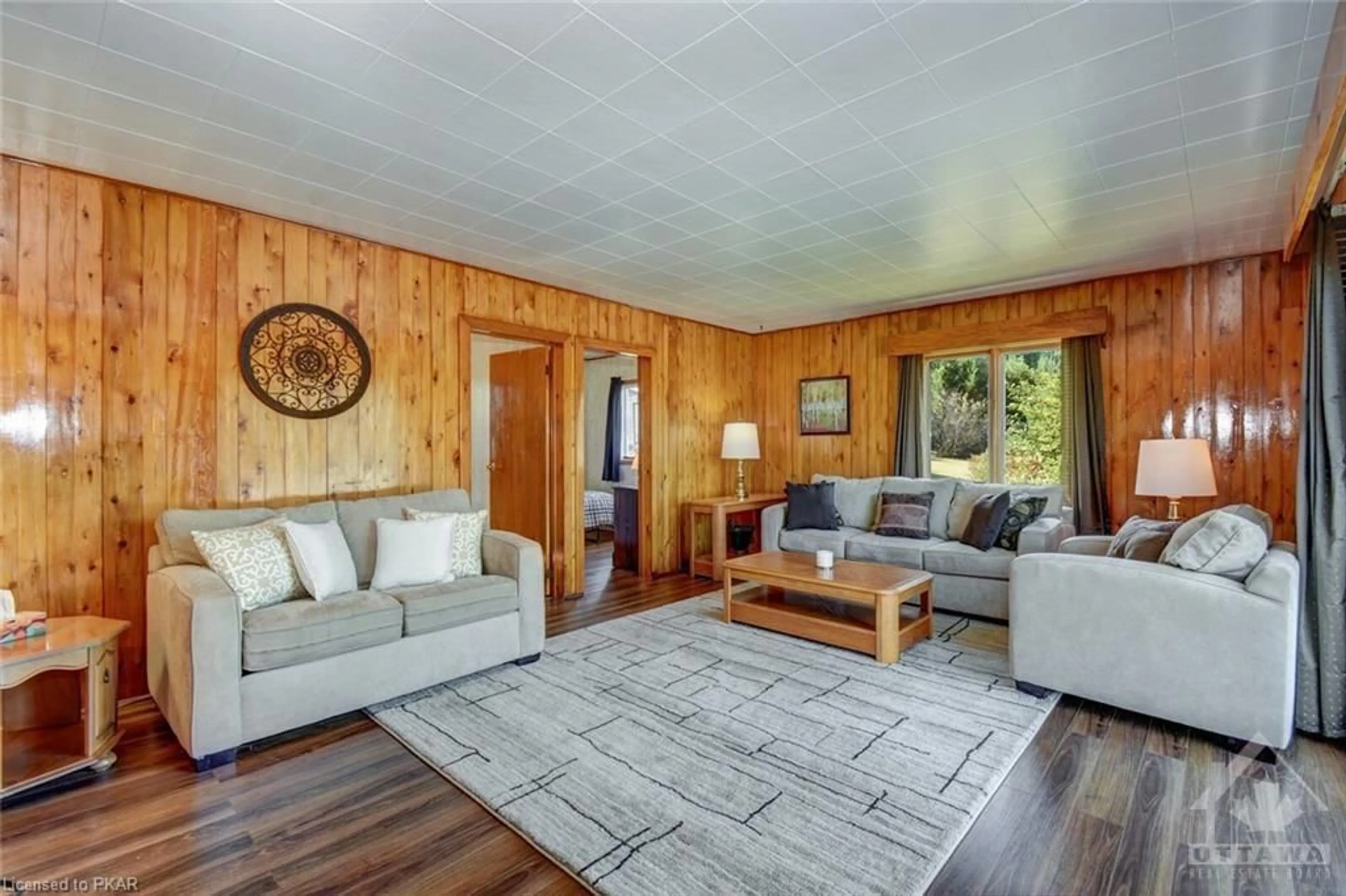 Living room, wood floors for 39086 COMBERMERE Rd, Combermere Ontario K0J 1L0