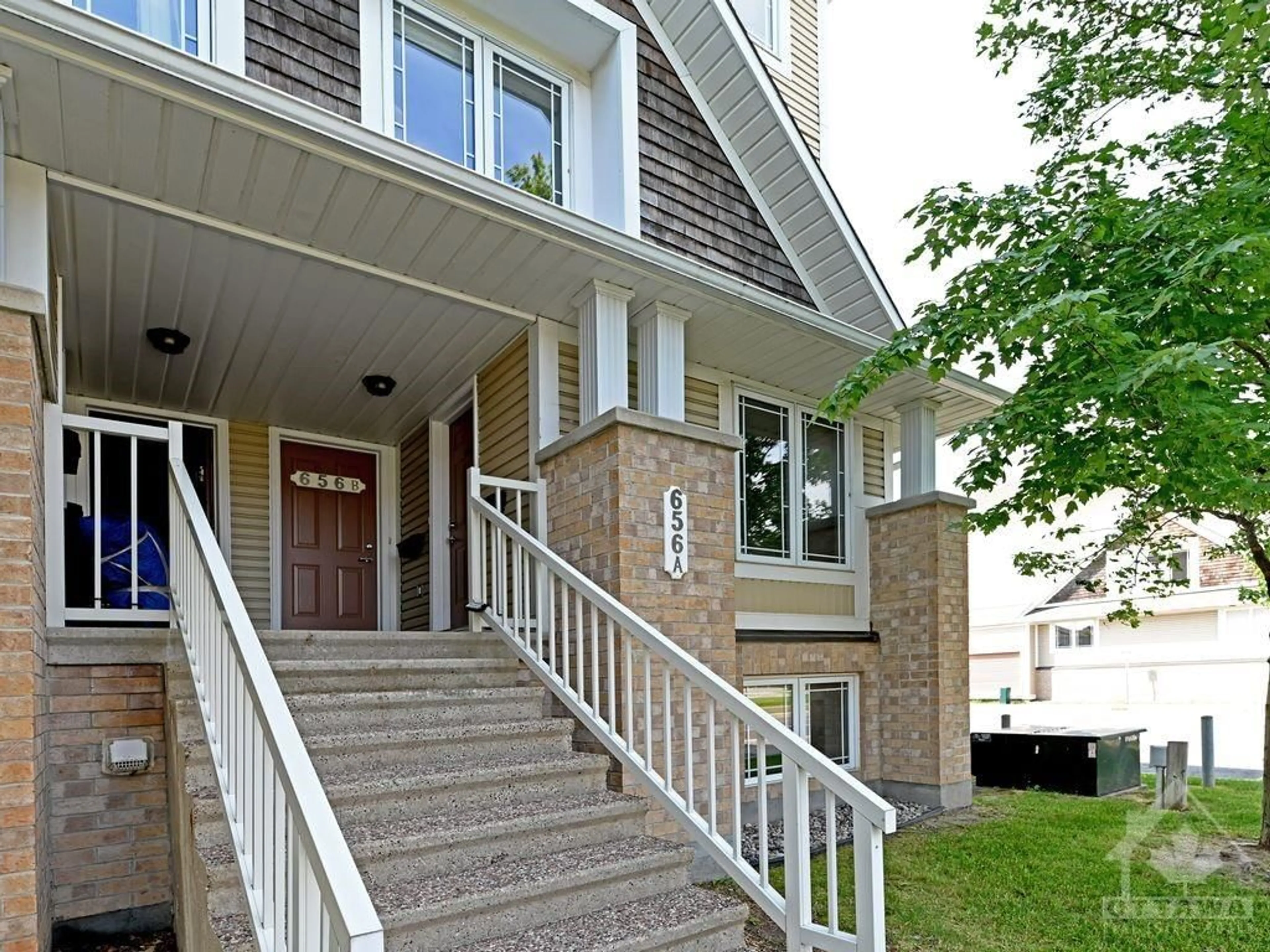 A pic from exterior of the house or condo for 656 CHAPMAN MILLS Dr #A, Ottawa Ontario K2J 3V2