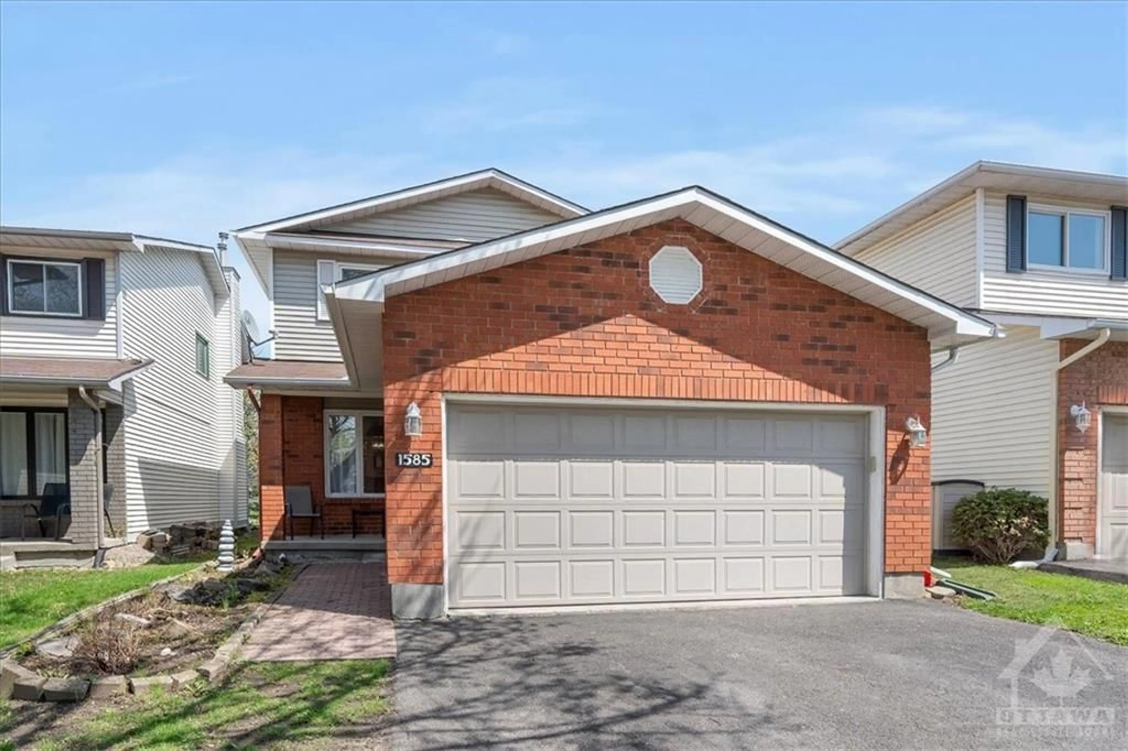 Home with brick exterior material for 1585 MONTCERF Crt, Ottawa Ontario K1C 4Z6