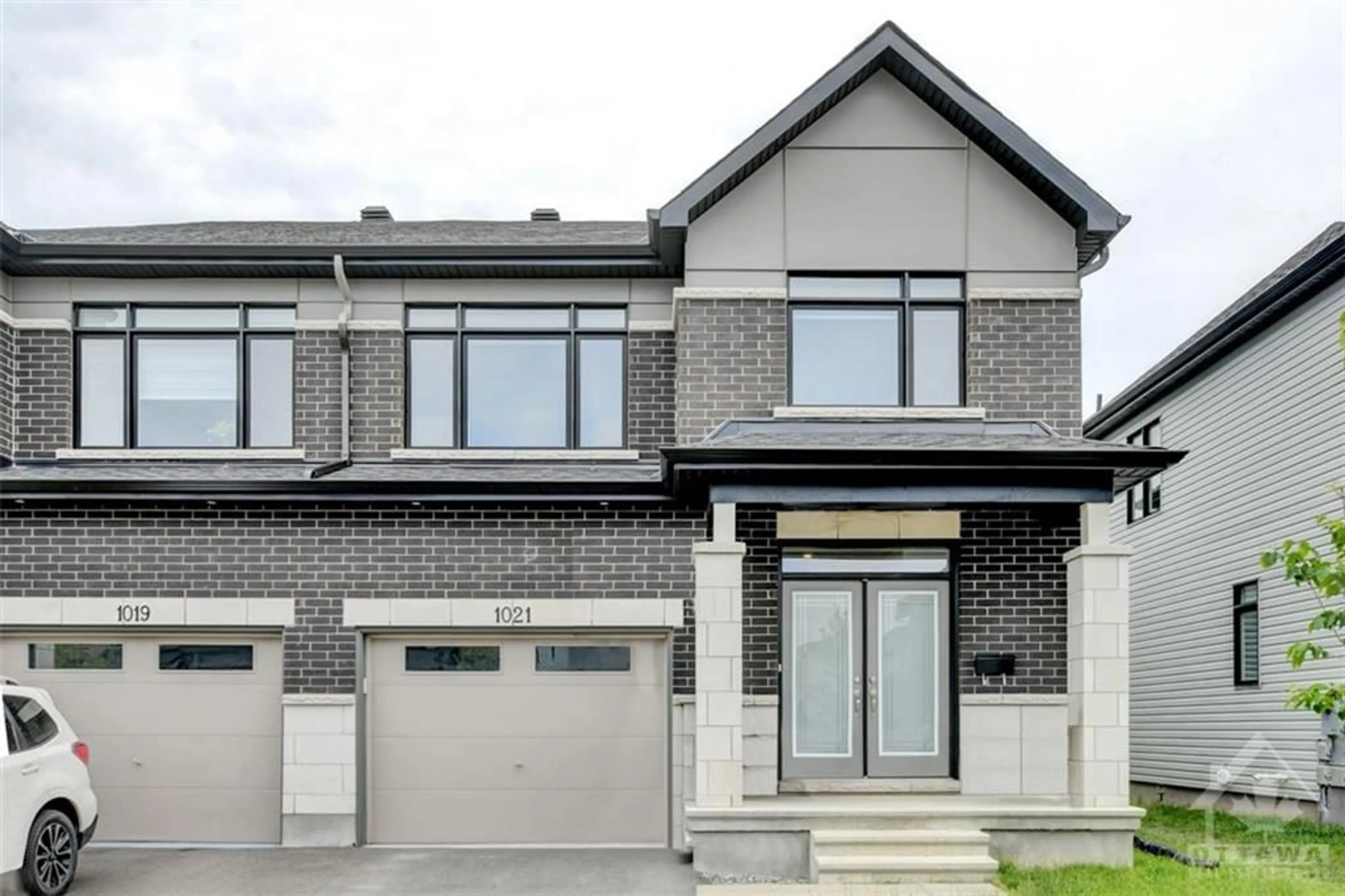 Home with brick exterior material for 1021 HYDRANGEA Ave, Ottawa Ontario K4M 0L4