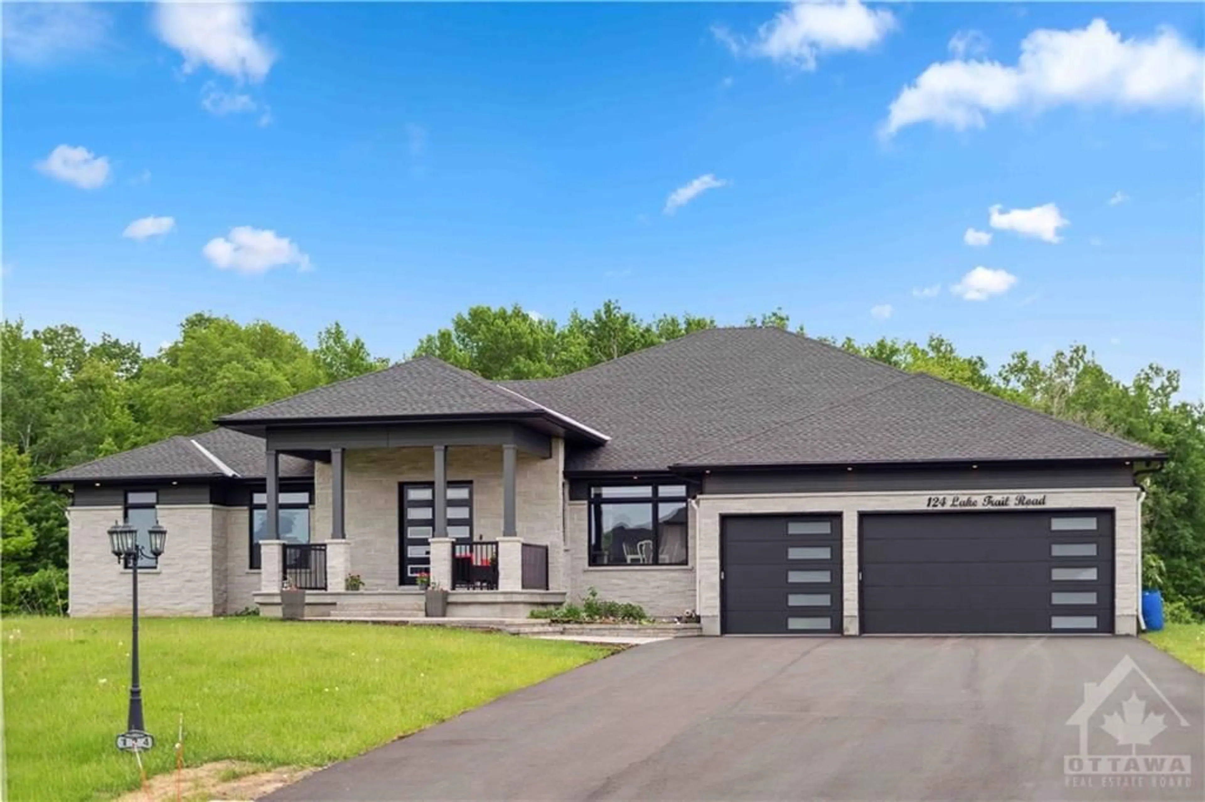 Frontside or backside of a home for 124 LAKE TRAIL Rd, Greely Ontario K4P 1L3