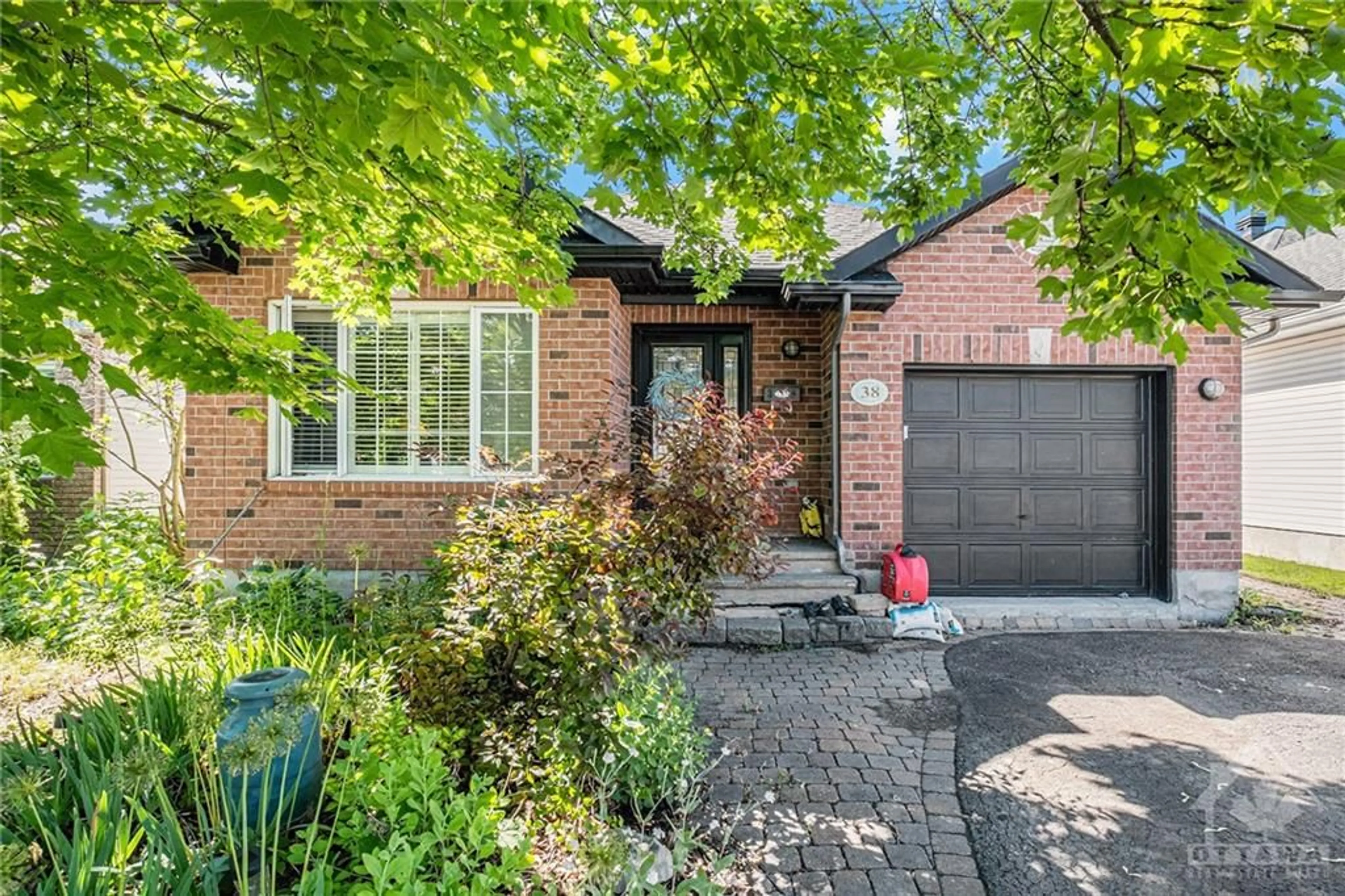 Home with brick exterior material for 38 MAYFORD Ave, Ottawa Ontario K2G 6A6